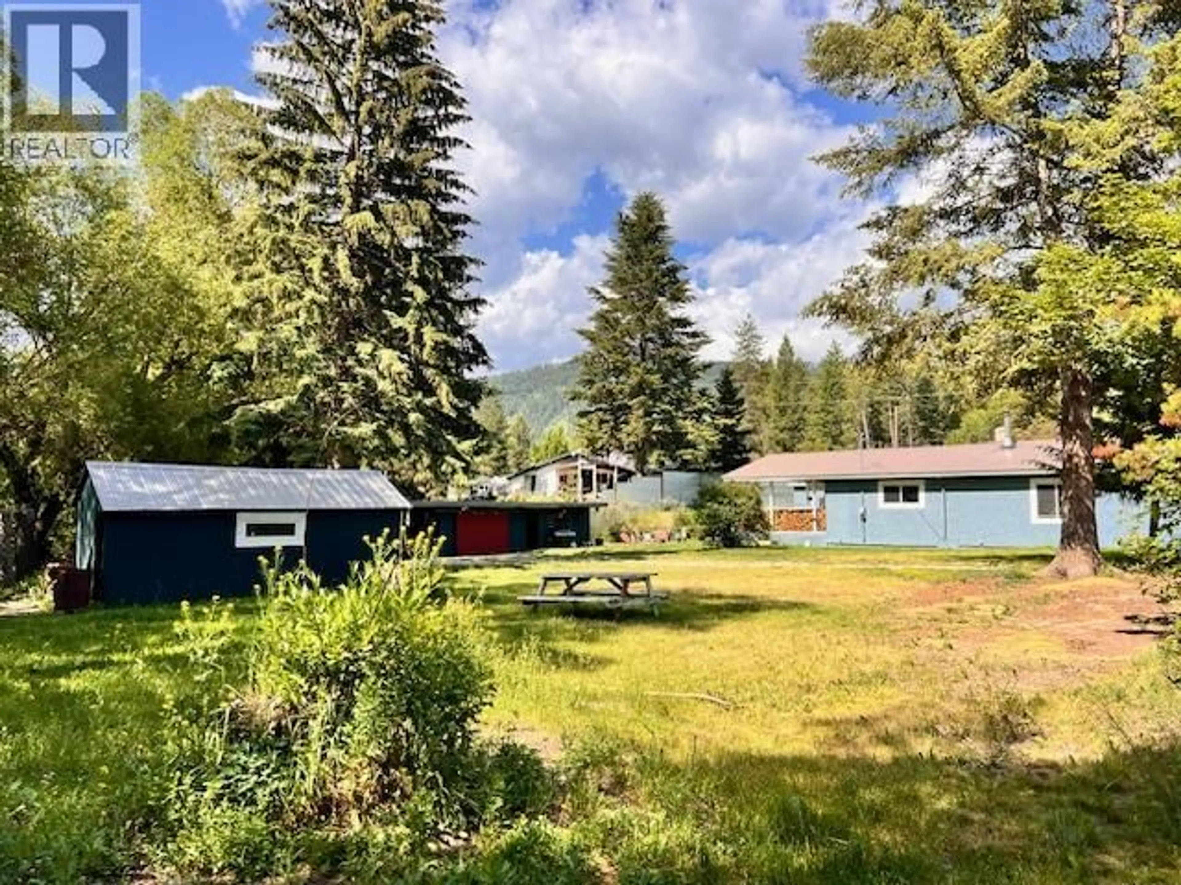 A pic from outside/outdoor area/front of a property/back of a property/a pic from drone, forest/trees view for 20 WALLACE MOUNTAIN ROAD, Beaverdell British Columbia V0H1A0