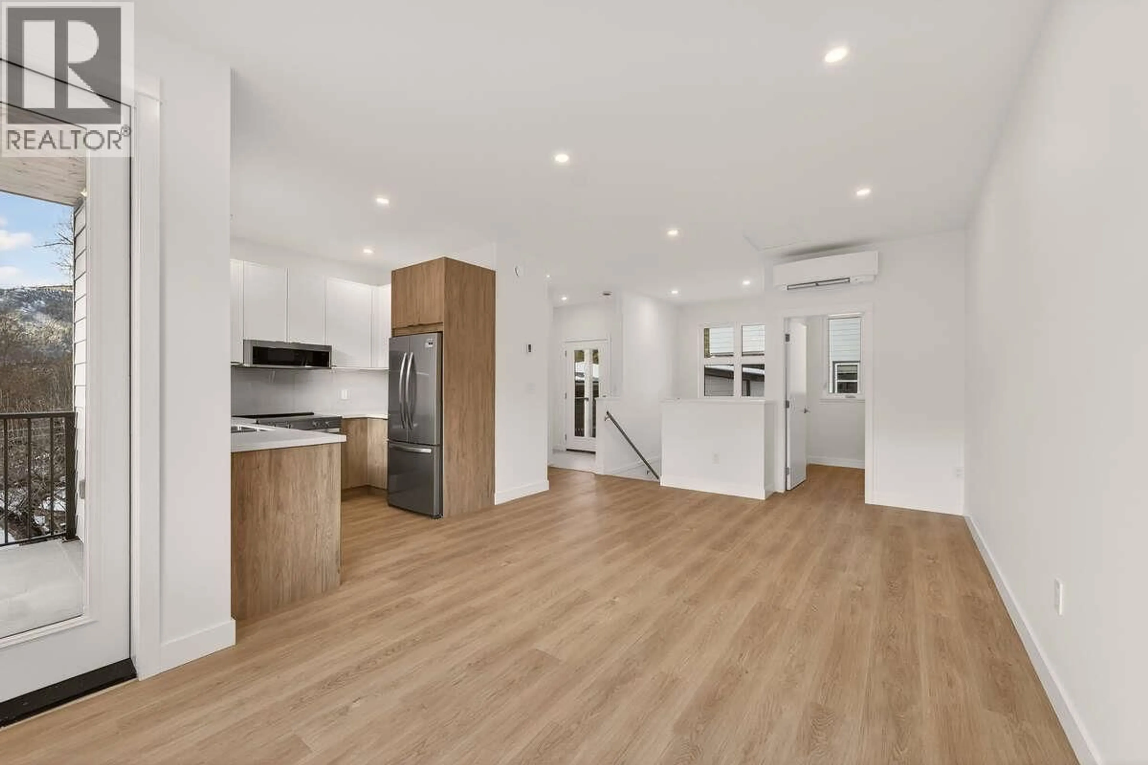 Open concept kitchen, wood/laminate floor for A - 2224 FALLS STREET, Nelson British Columbia V1L1K4