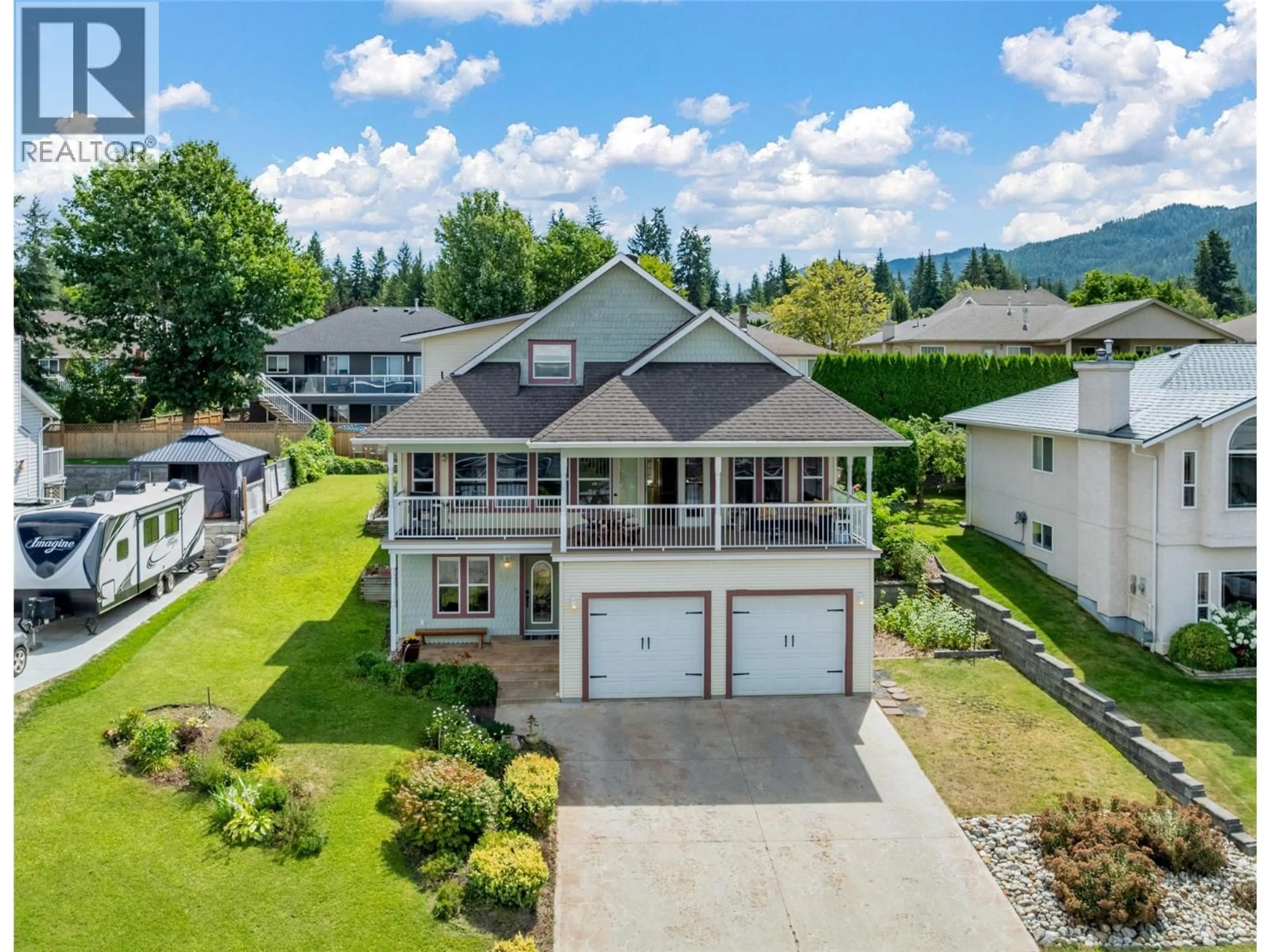 A pic from outside/outdoor area/front of a property/back of a property/a pic from drone, mountain view for 2500 4TH AVENUE SOUTHEAST, Salmon Arm British Columbia V1E1K7