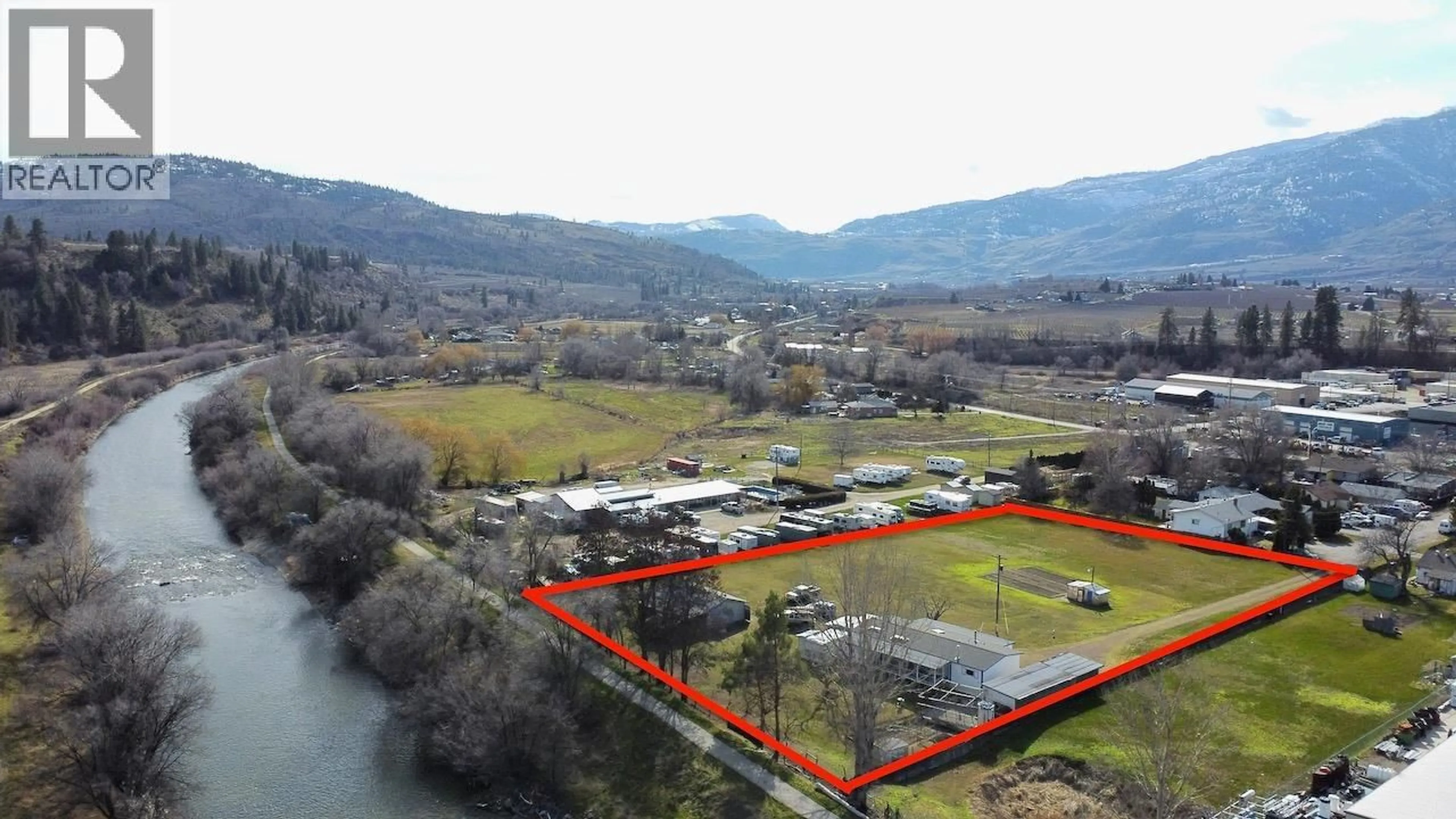 A pic from outside/outdoor area/front of a property/back of a property/a pic from drone, water/lake/river/ocean view for 129 WALNUT PLACE, Oliver British Columbia V0H1T9