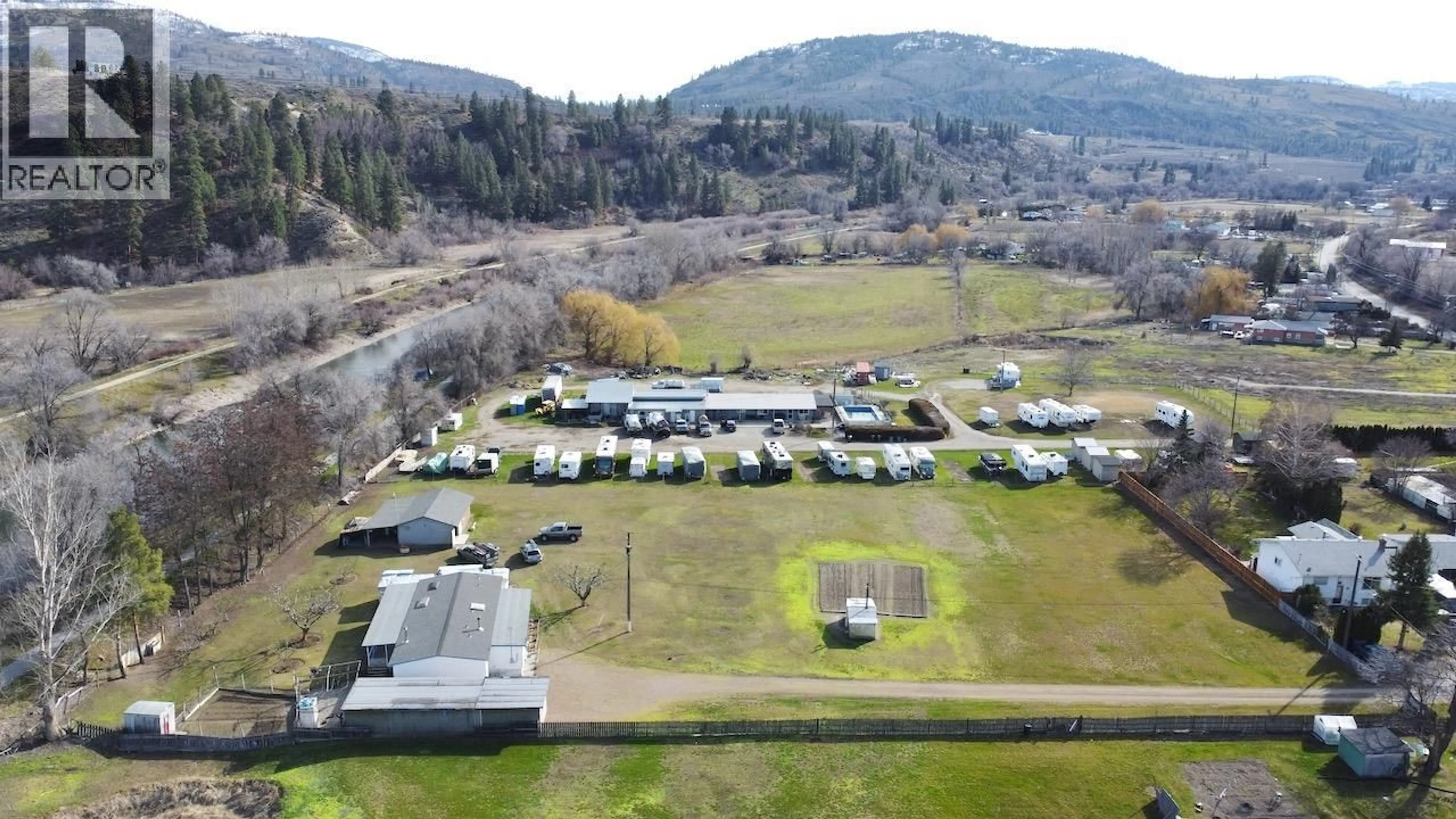 A pic from outside/outdoor area/front of a property/back of a property/a pic from drone, mountain view for 129 WALNUT PLACE, Oliver British Columbia V0H1T9
