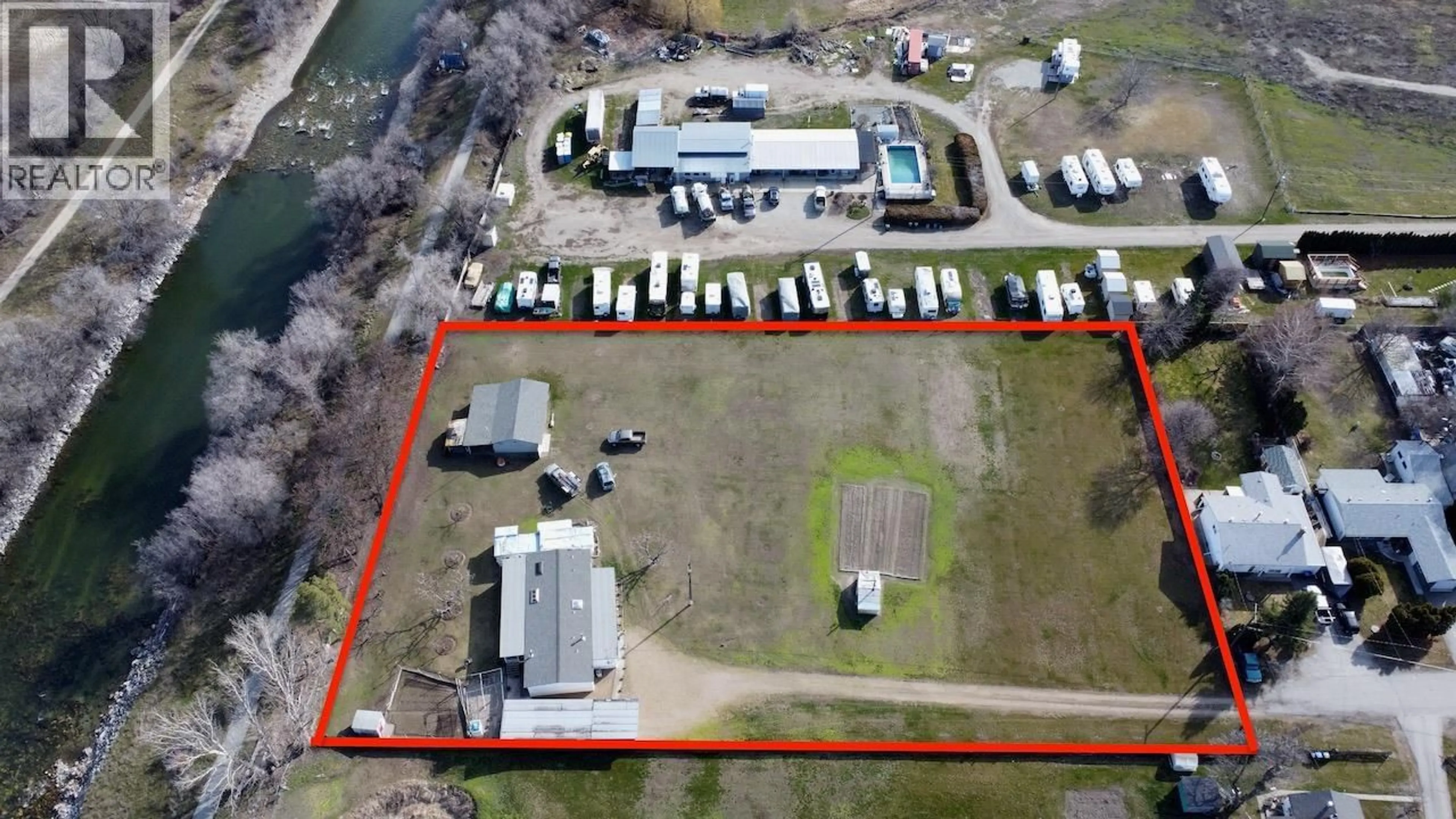 A pic from outside/outdoor area/front of a property/back of a property/a pic from drone, building for 129 WALNUT PLACE, Oliver British Columbia V0H1T9