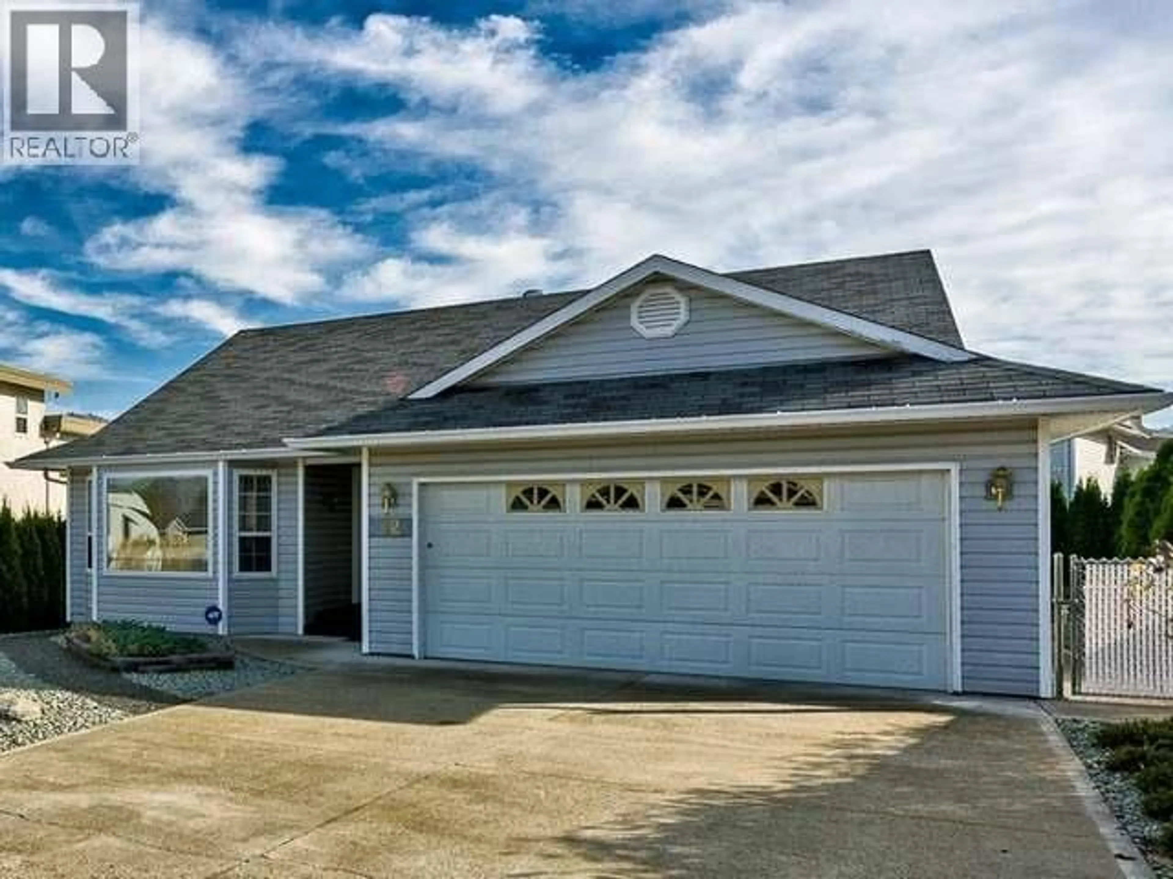 Home with vinyl exterior material, street for 12 HEATHER PLACE, Osoyoos British Columbia V0H1V1