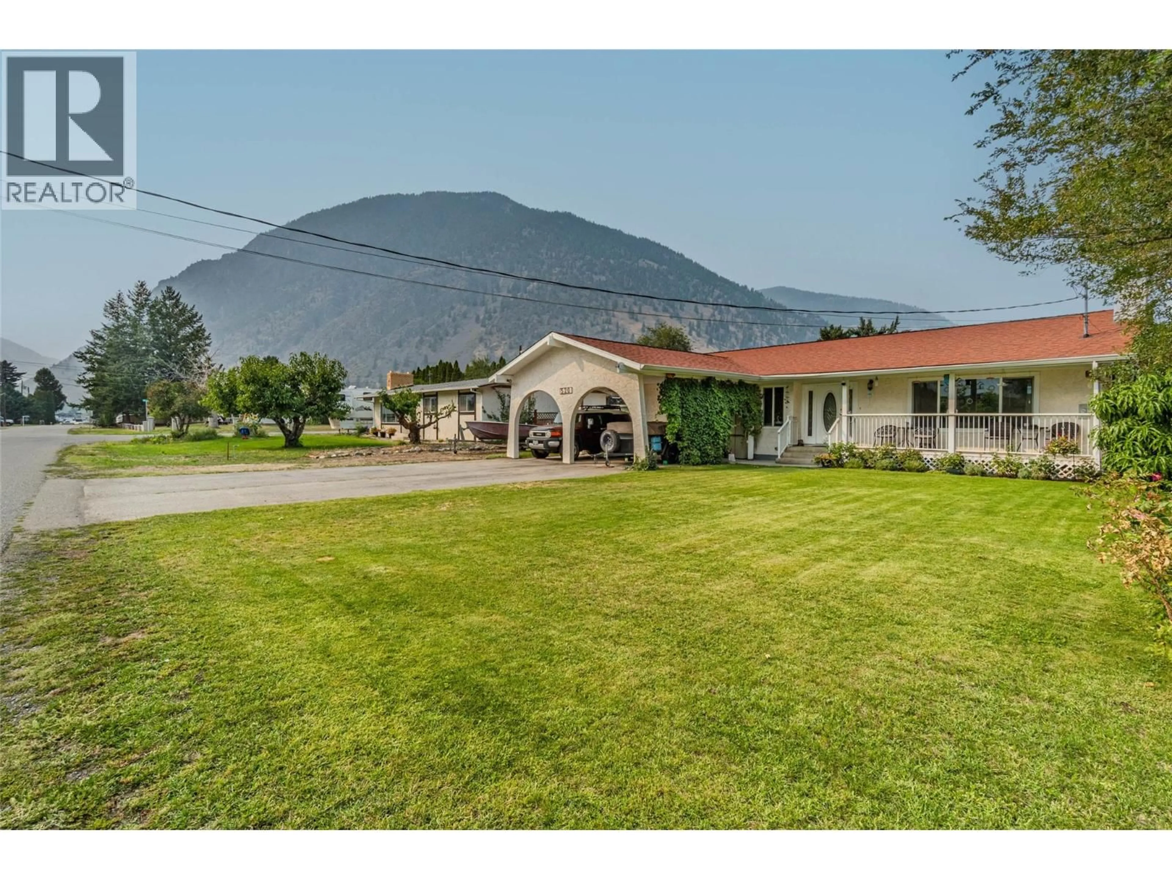 A pic from outside/outdoor area/front of a property/back of a property/a pic from drone, mountain view for 520 3RD AVENUE, Keremeos British Columbia V0X1N2