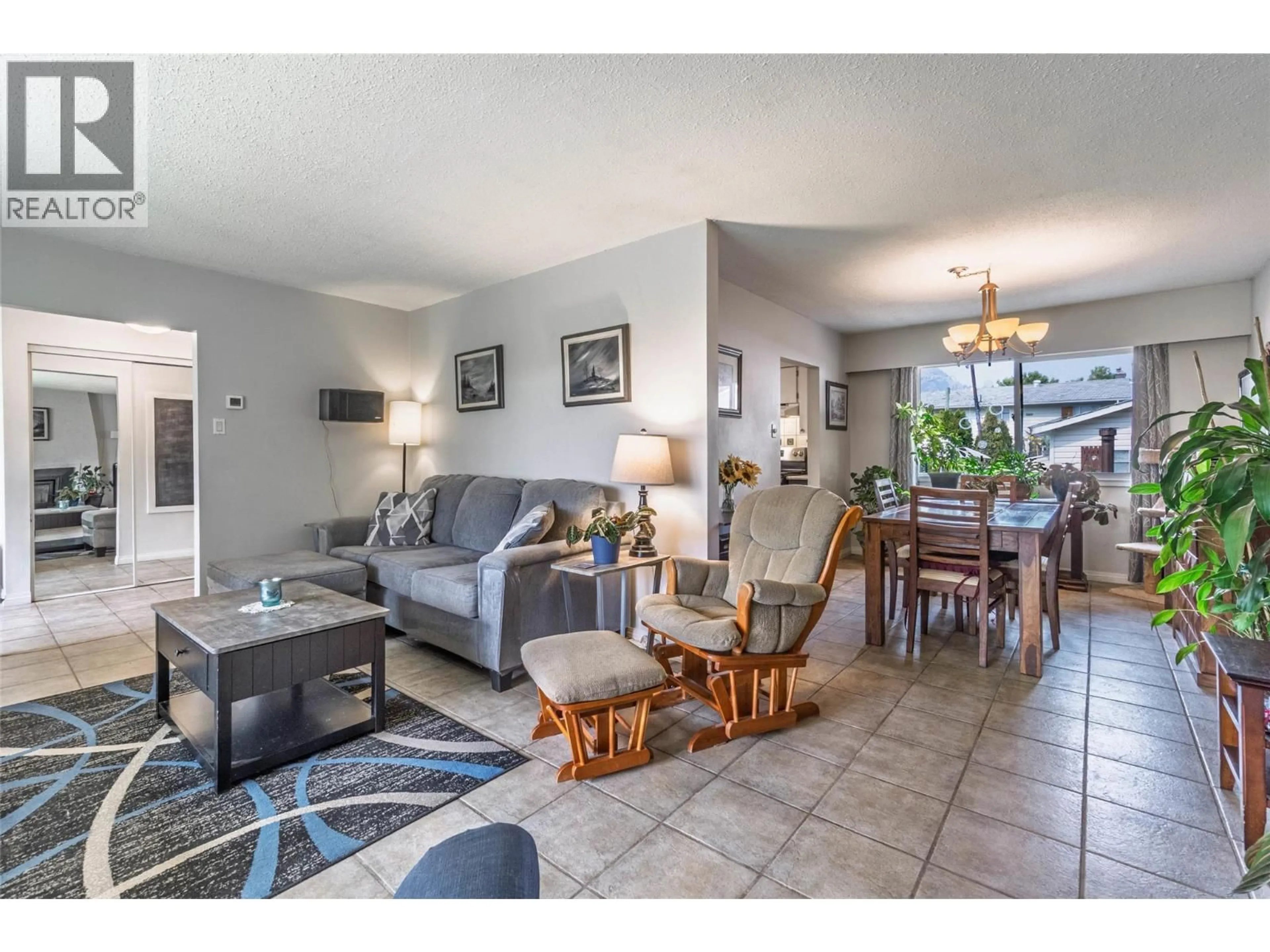 Living room with furniture, ceramic/tile floor for 520 3RD AVENUE, Keremeos British Columbia V0X1N2