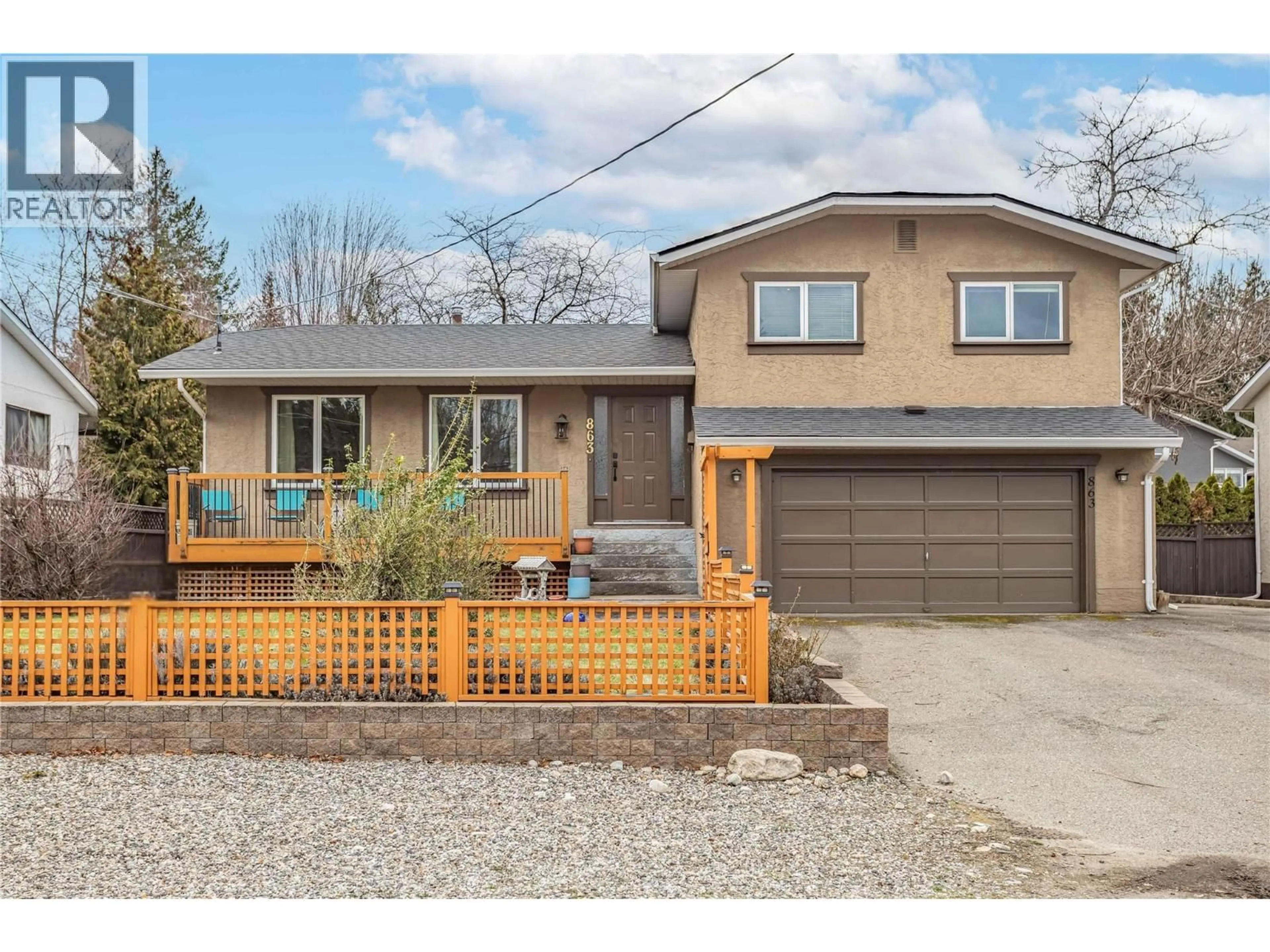 Home with vinyl exterior material, street for 863 HAMMER AVENUE, Kelowna British Columbia V1W2B7
