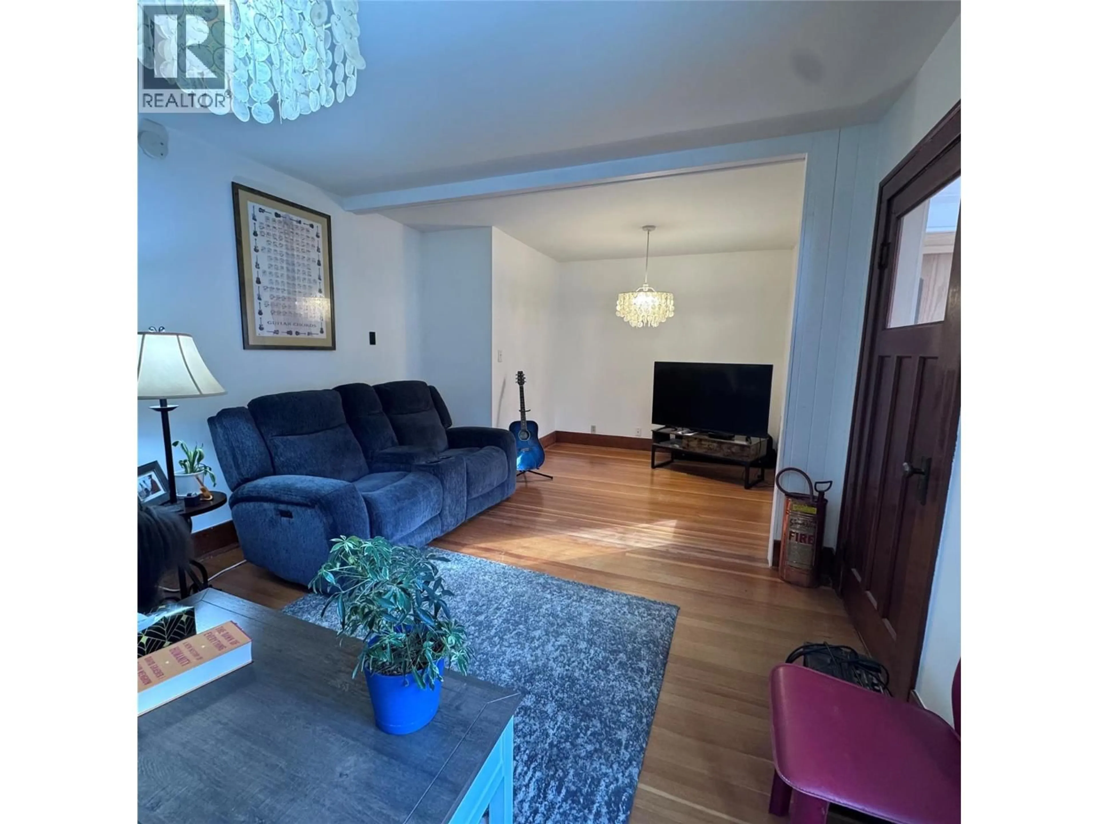 Living room with furniture, wood/laminate floor for 640 WALLINGER AVENUE, Kimberley British Columbia V1A2A1