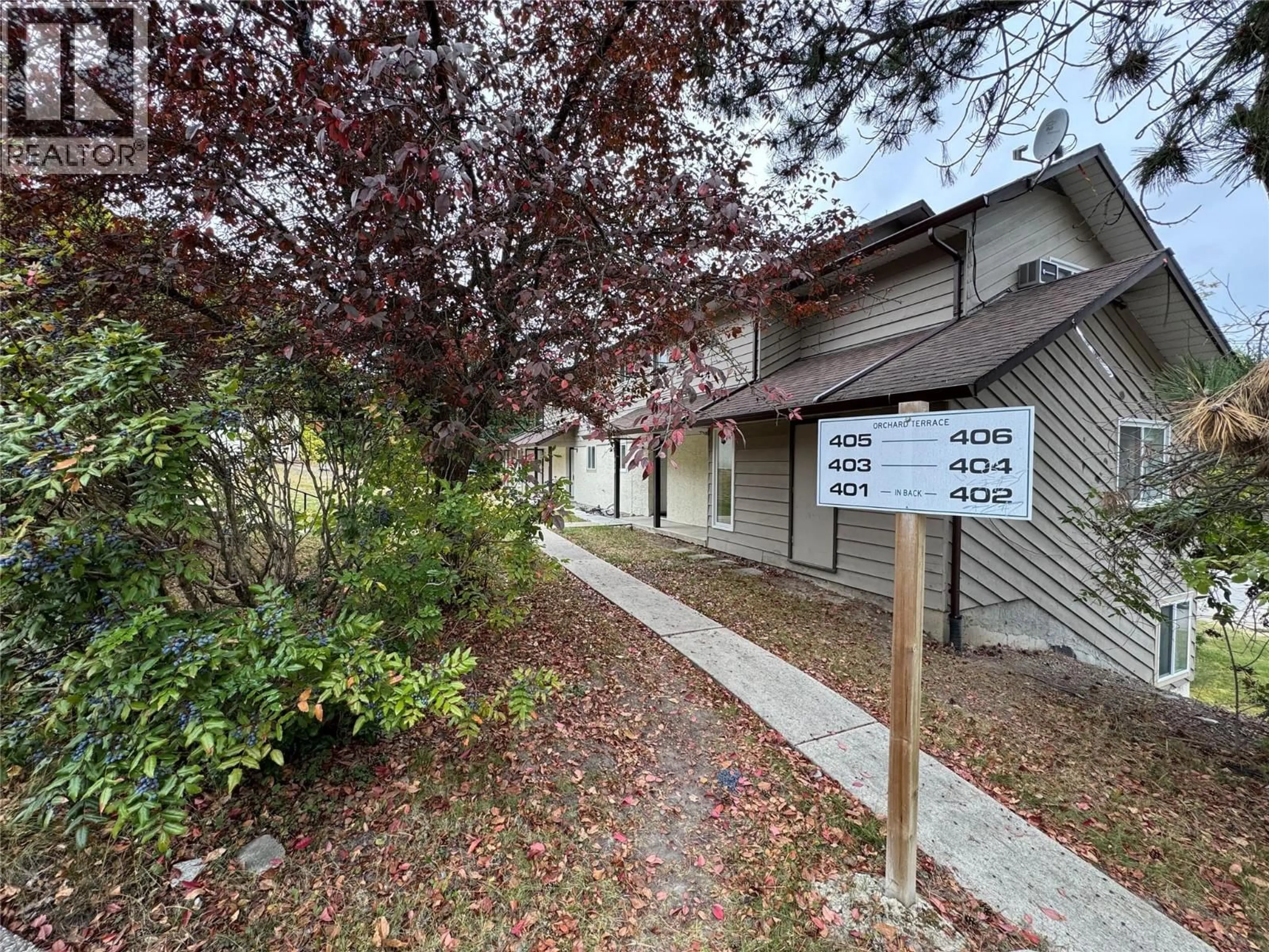 A pic from outside/outdoor area/front of a property/back of a property/a pic from drone, street for 403 - 1451 1 AVENUE NORTHEAST, Salmon Arm British Columbia V1E1N8