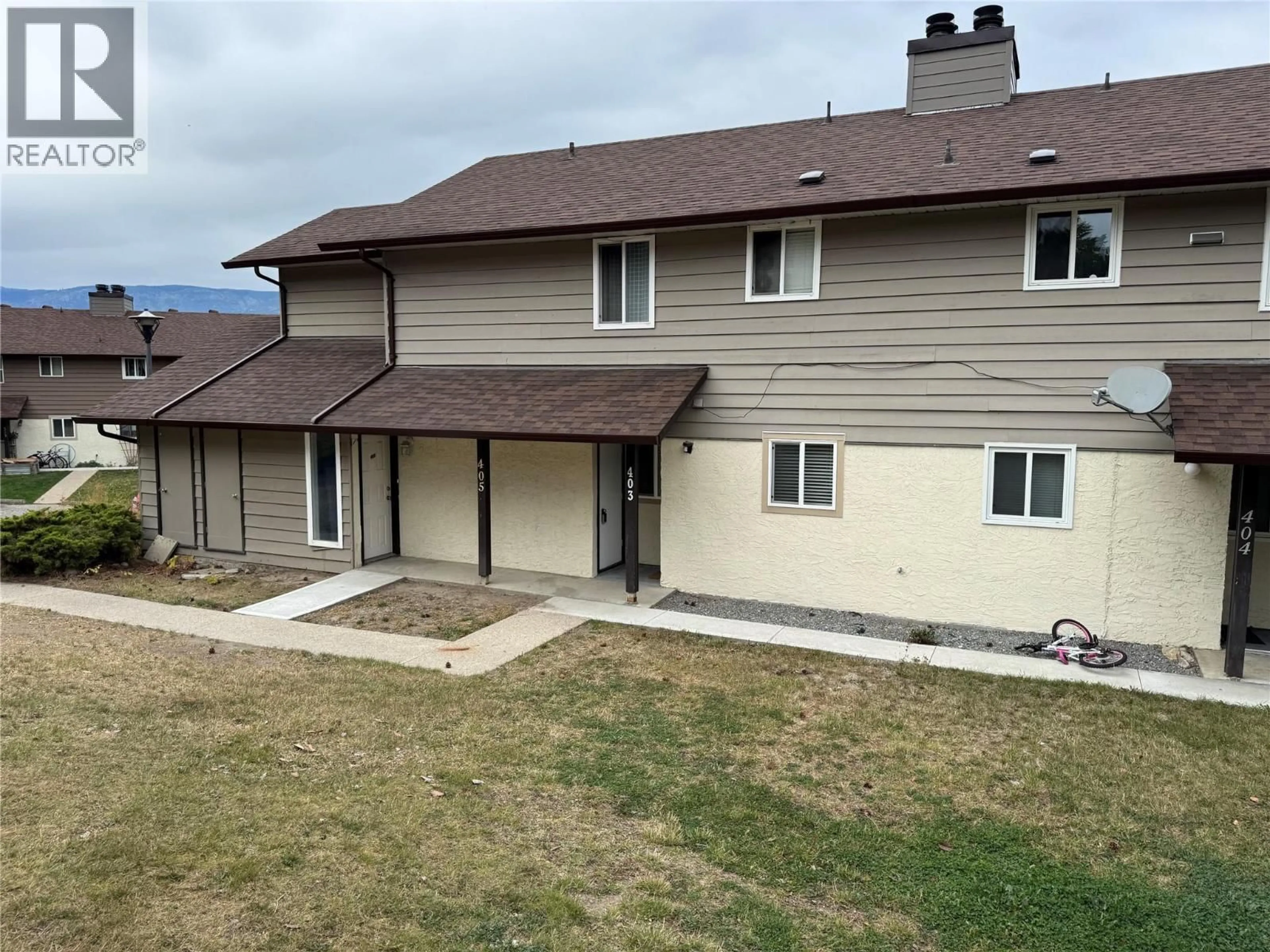 A pic from outside/outdoor area/front of a property/back of a property/a pic from drone, unknown for 403 - 1451 1 AVENUE NORTHEAST, Salmon Arm British Columbia V1E1N8