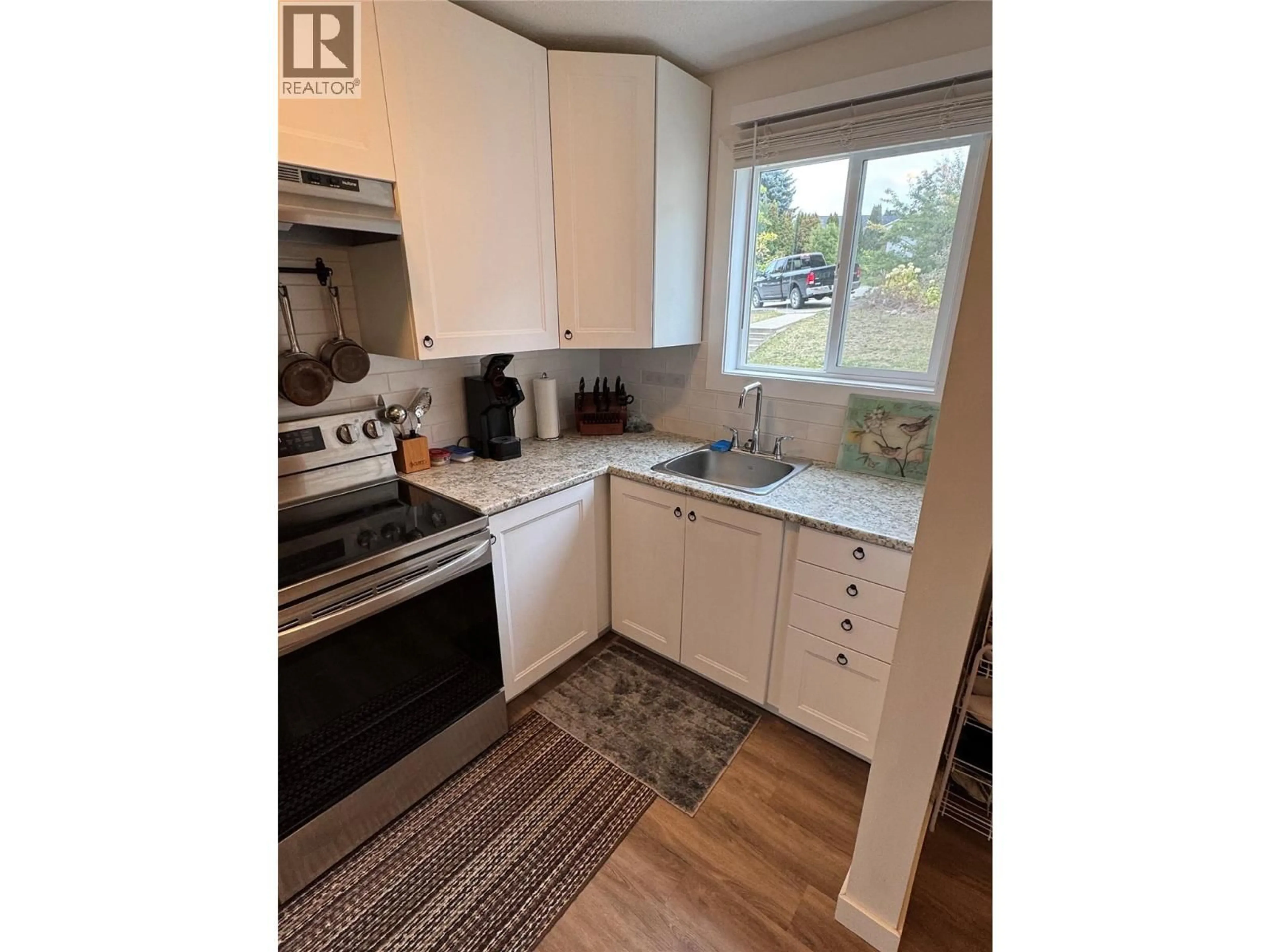 Standard kitchen, wood/laminate floor for 403 - 1451 1 AVENUE NORTHEAST, Salmon Arm British Columbia V1E1N8