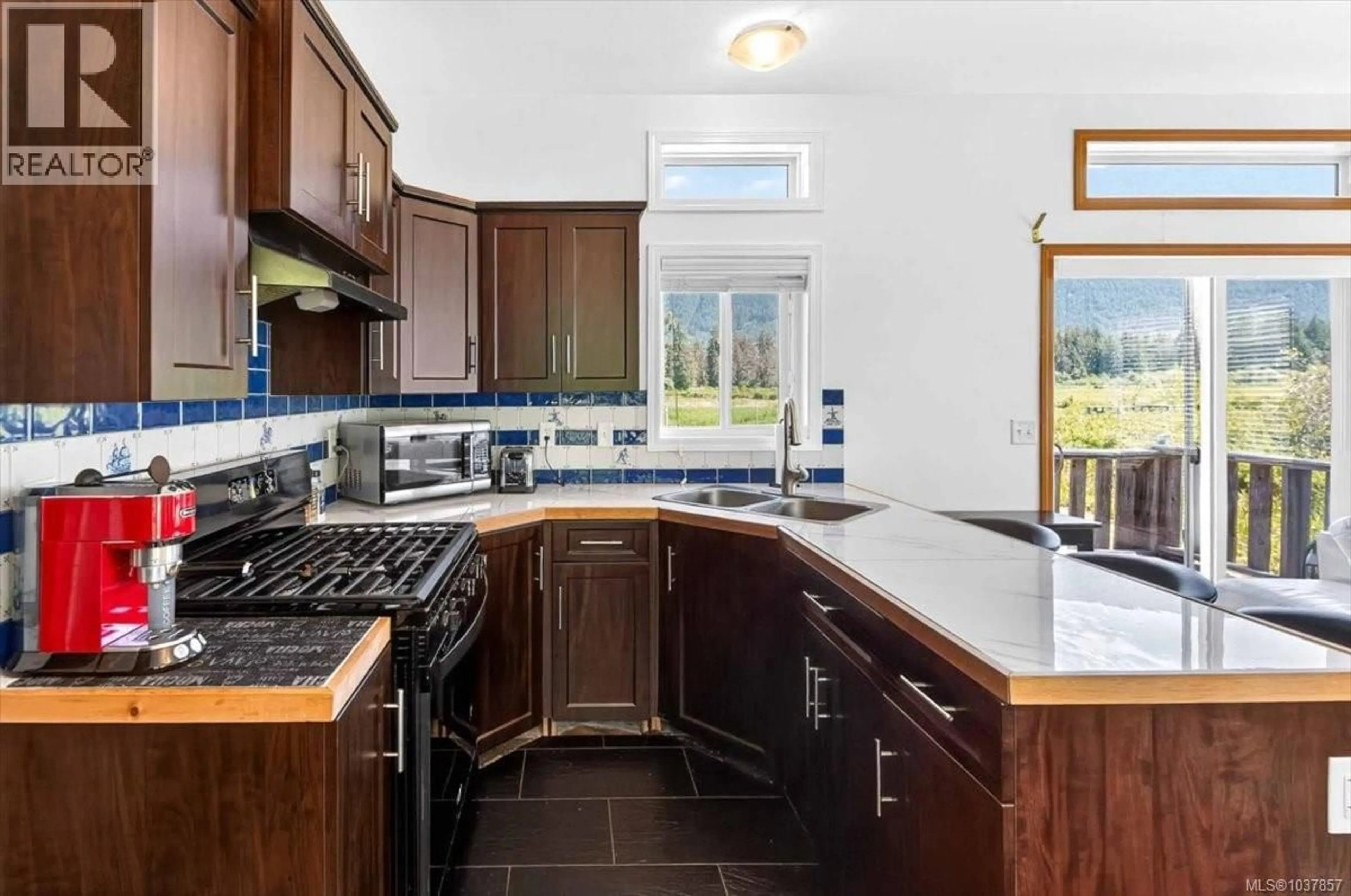 Open concept kitchen, ceramic/tile floor for 9589 COMOX TRAIL, Port Alberni British Columbia V9Y8N8