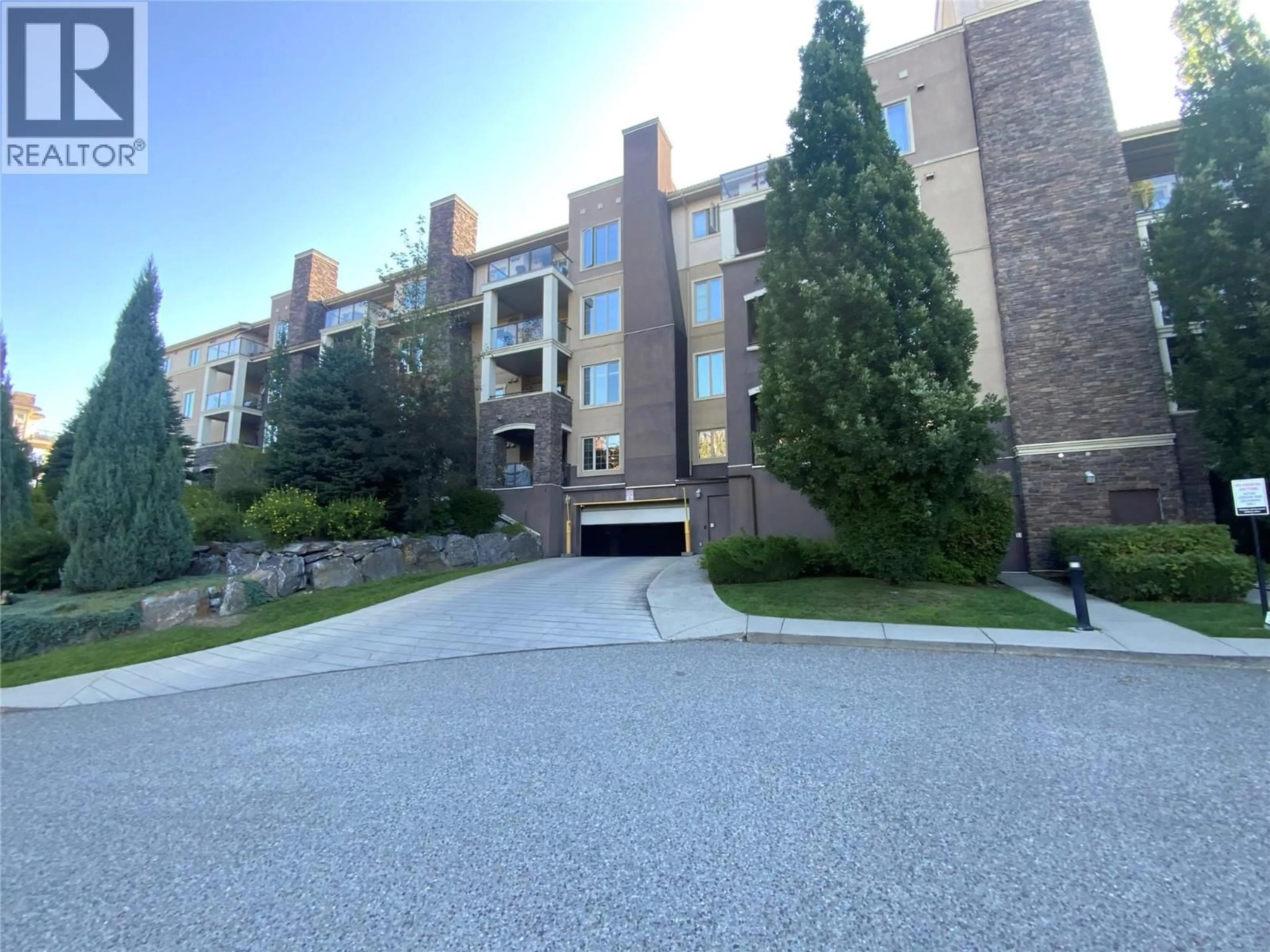 A pic from outside/outdoor area/front of a property/back of a property/a pic from drone, unknown for 2222 - 1873 COUNTRY CLUB ROAD, Kelowna British Columbia V1V2W6