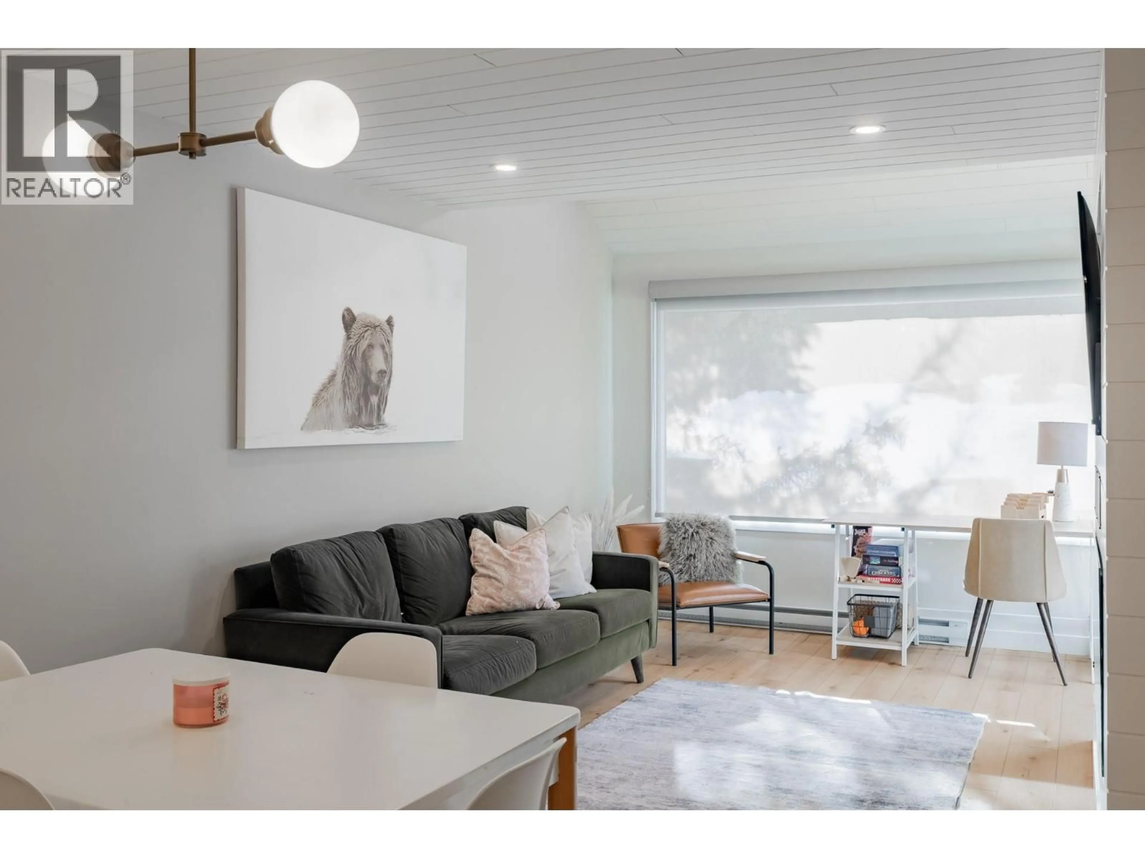 Living room with furniture, wood/laminate floor for 225 - 2035 PANORAMA DRIVE, Panorama British Columbia V0A1T0