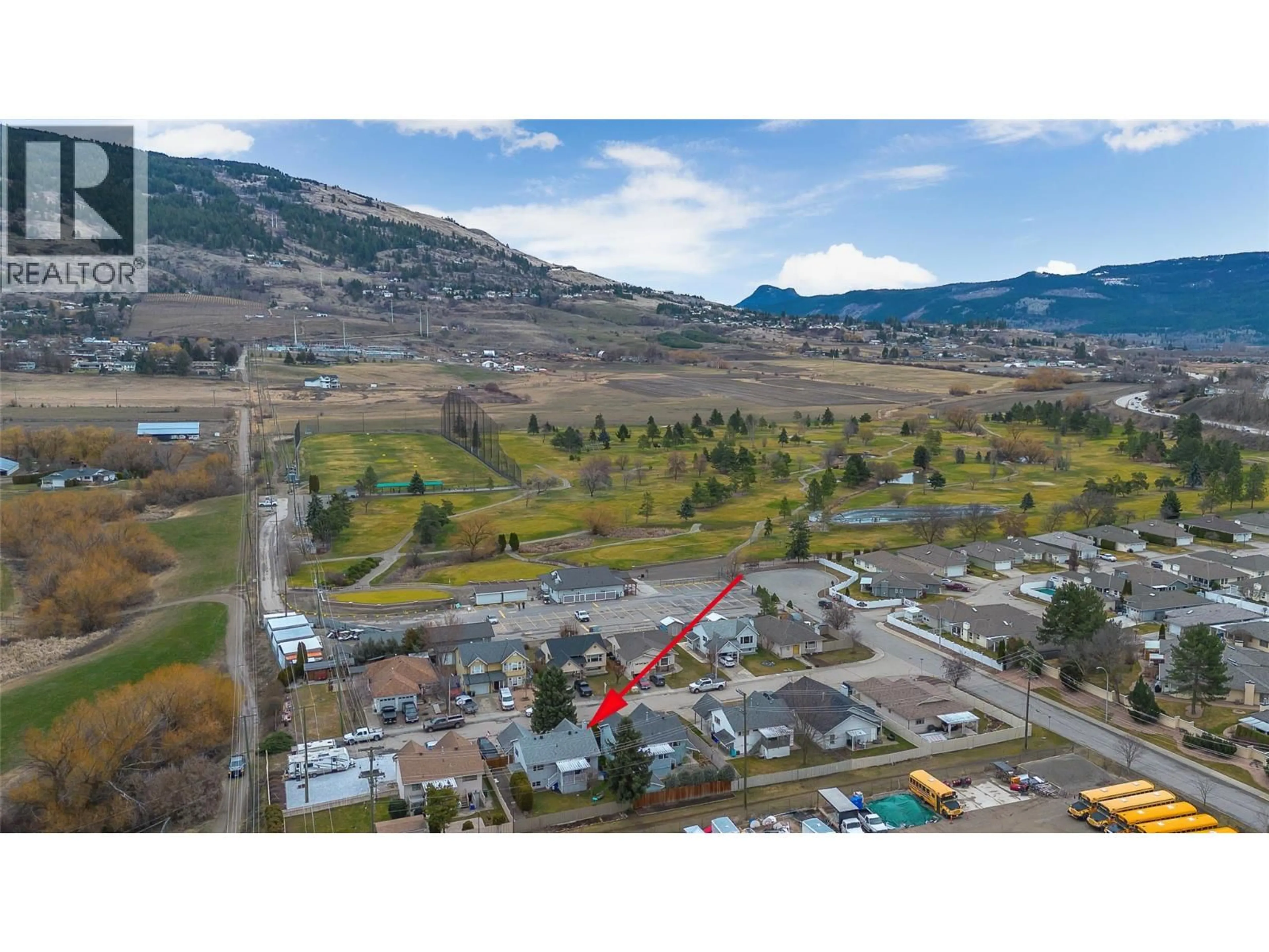 A pic from outside/outdoor area/front of a property/back of a property/a pic from drone, mountain view for 1416 12 STREET, Vernon British Columbia V1B2S6