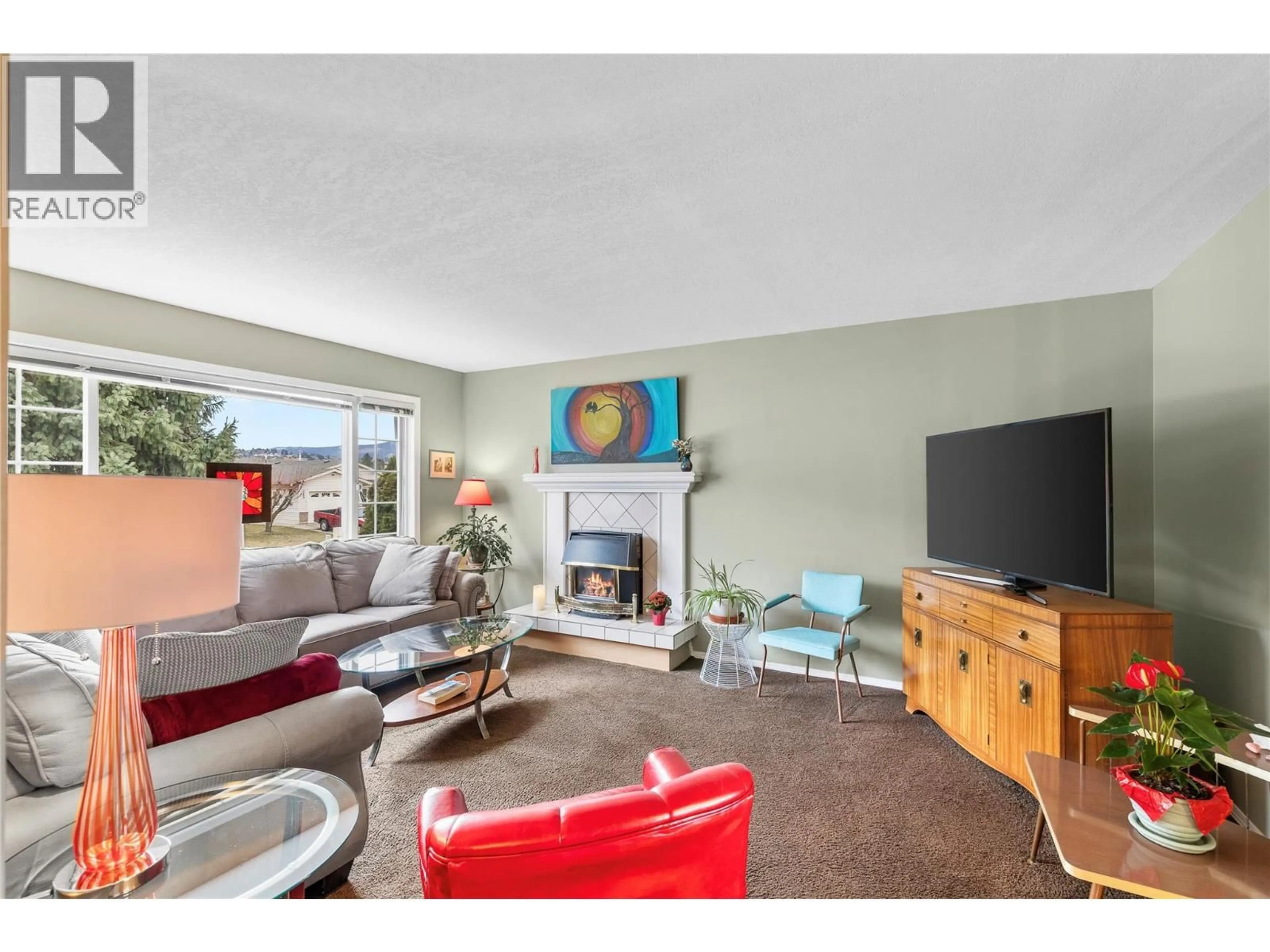 Living room with furniture, unknown for 1416 12 STREET, Vernon British Columbia V1B2S6