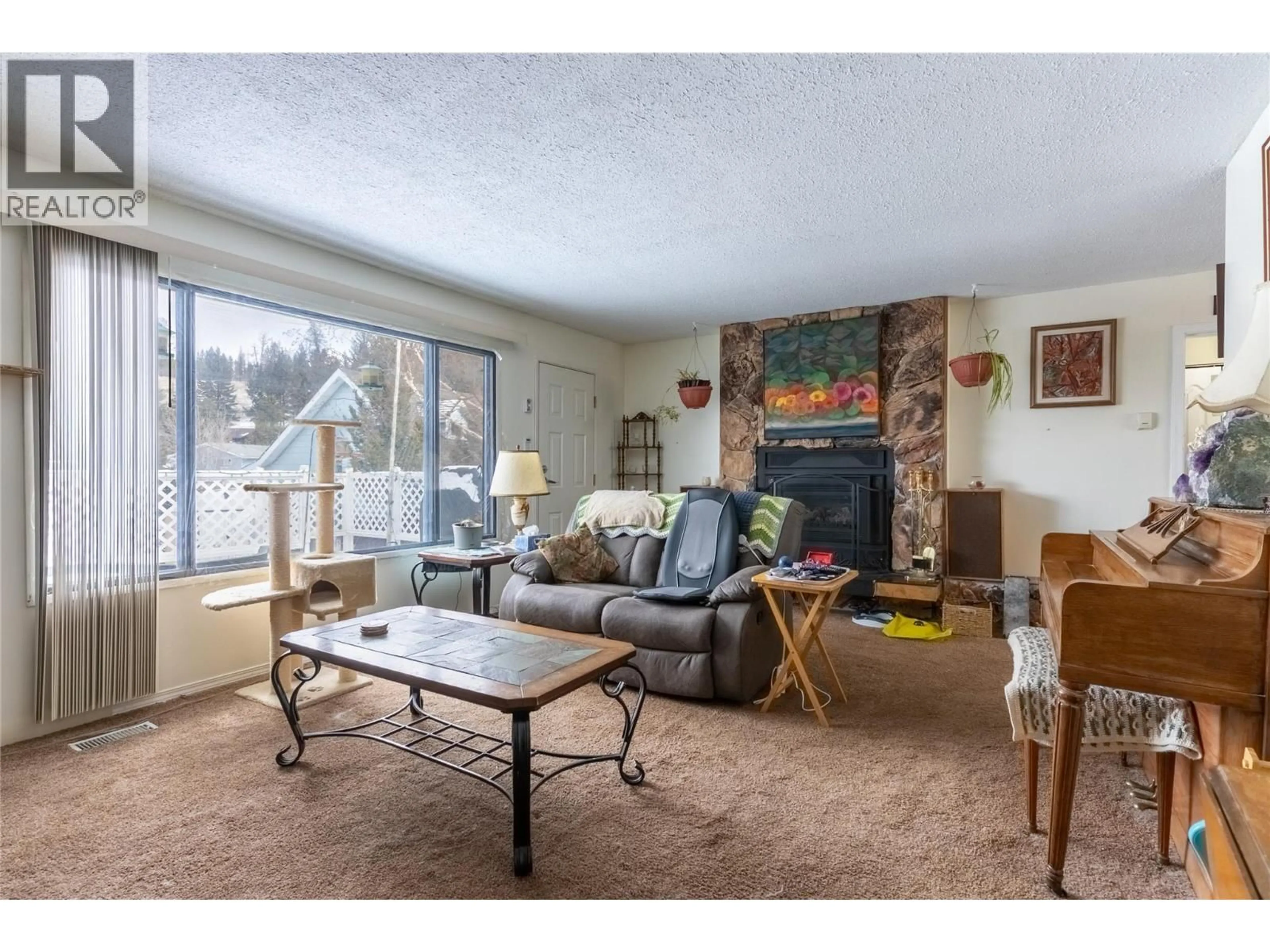 Living room with furniture, unknown for 52 BRECCIA DRIVE, Logan Lake British Columbia V0K1W0
