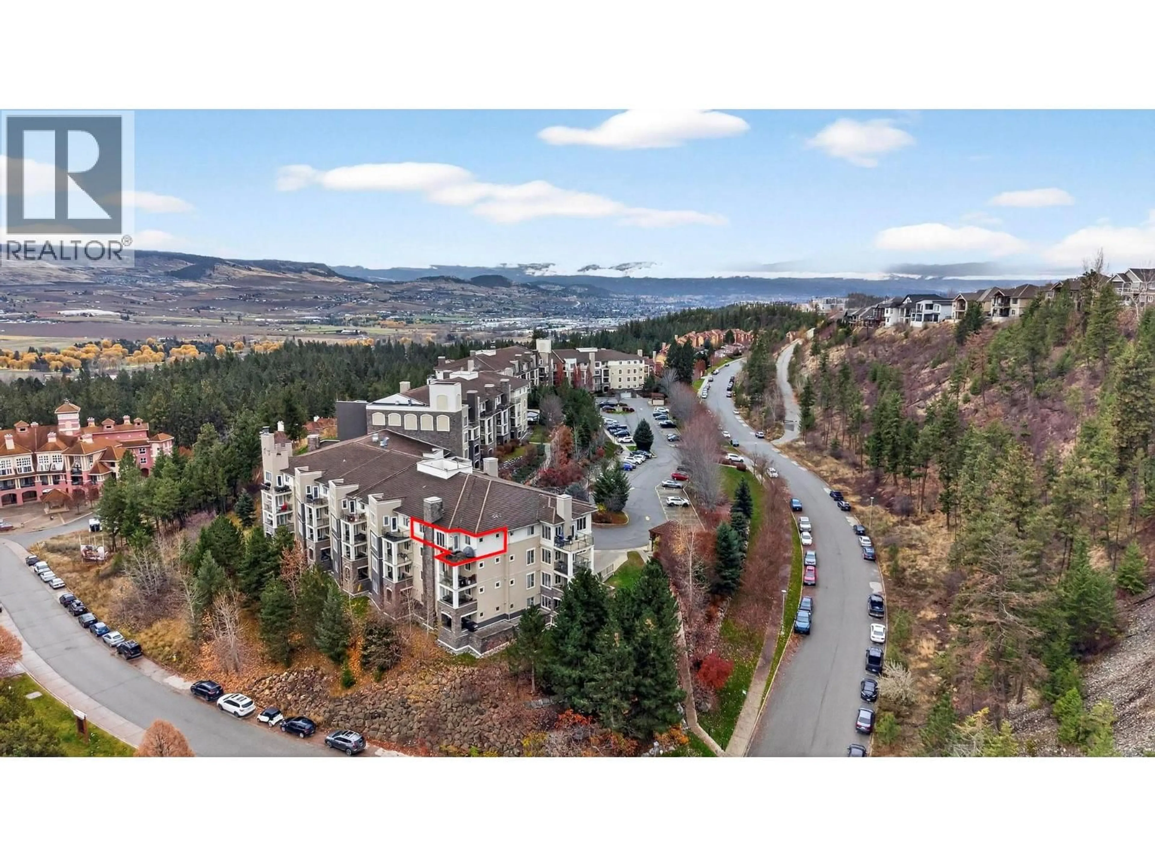 A pic from outside/outdoor area/front of a property/back of a property/a pic from drone, mountain view for 1402 - 1875 COUNTRY CLUB DRIVE, Kelowna British Columbia v1v2w7