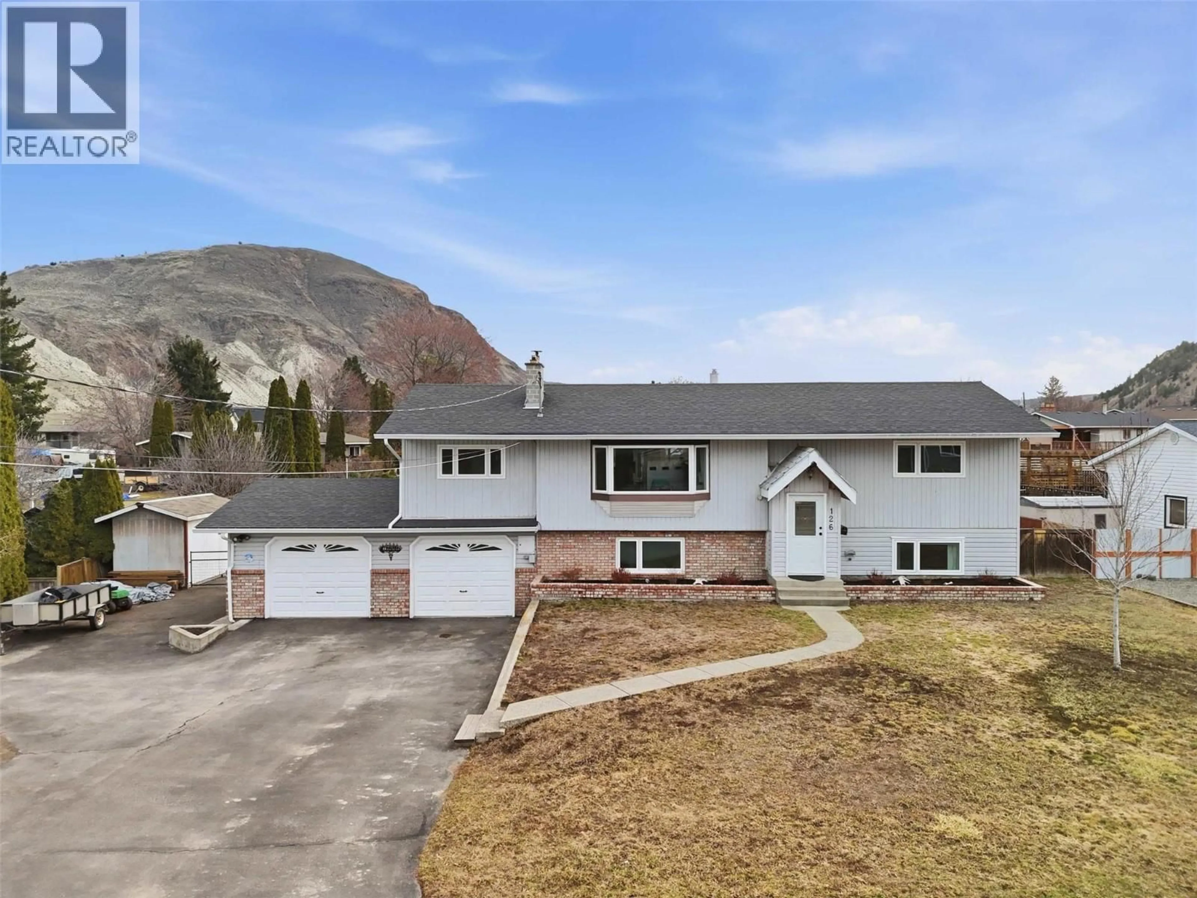 A pic from outside/outdoor area/front of a property/back of a property/a pic from drone, mountain view for 126 PARLOW ROAD, Kamloops British Columbia V2C4Z8