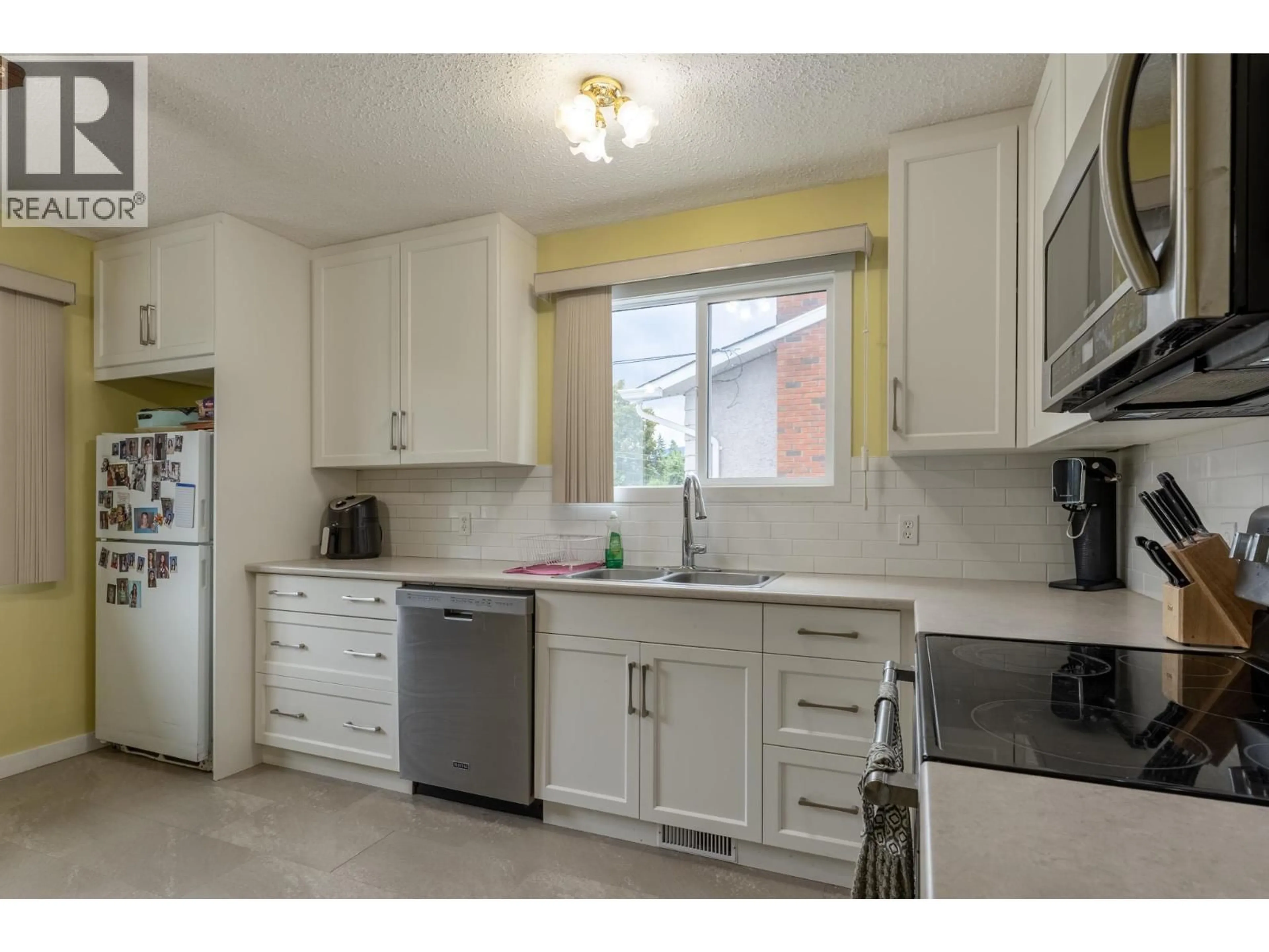 Standard kitchen, ceramic/tile floor for 192 BARBER ROAD, Kelowna British Columbia V1X3V4