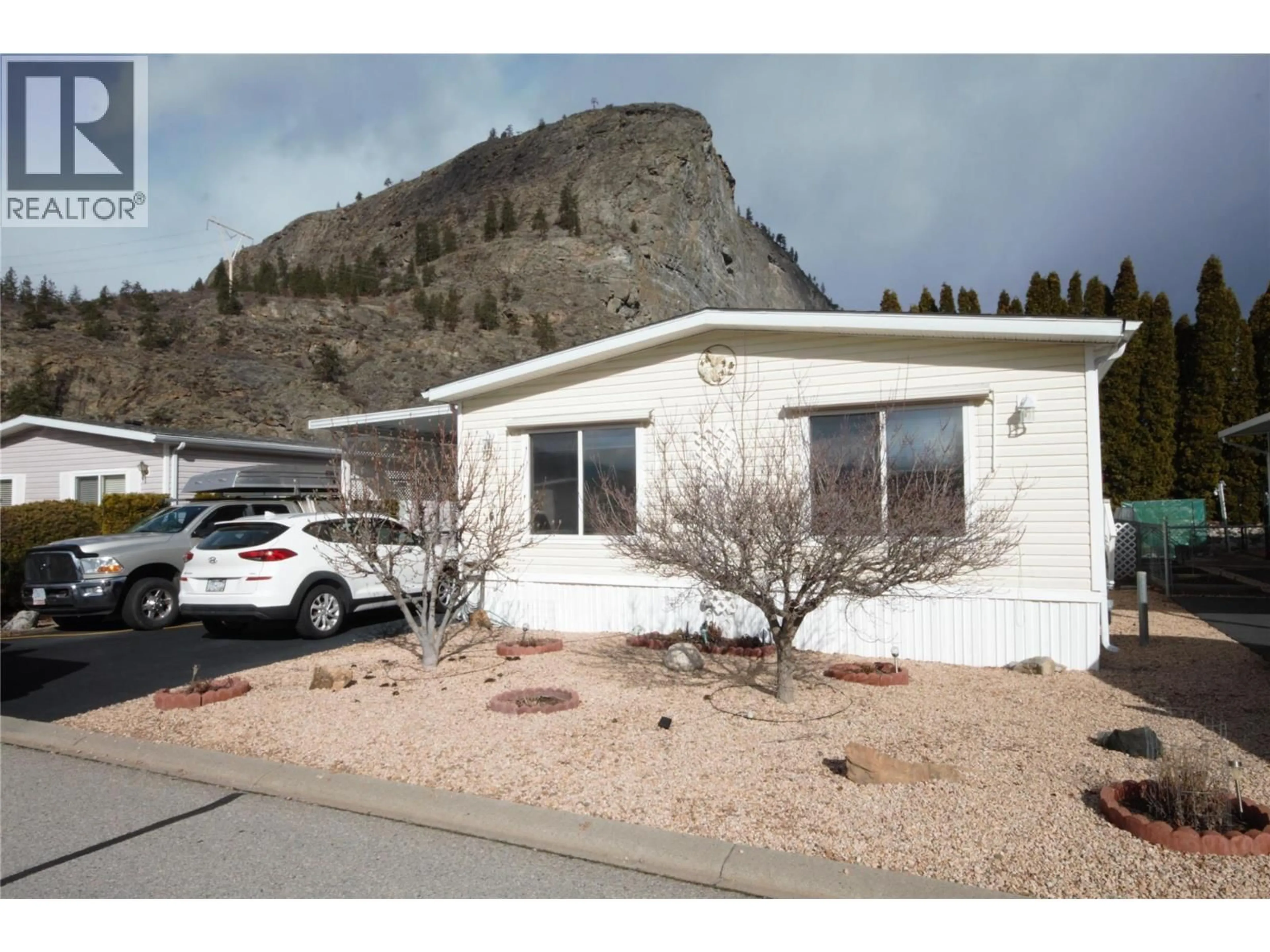 Home with vinyl exterior material, mountain view for 6 - 8598 97 HIGHWAY, Oliver British Columbia V0H1T2