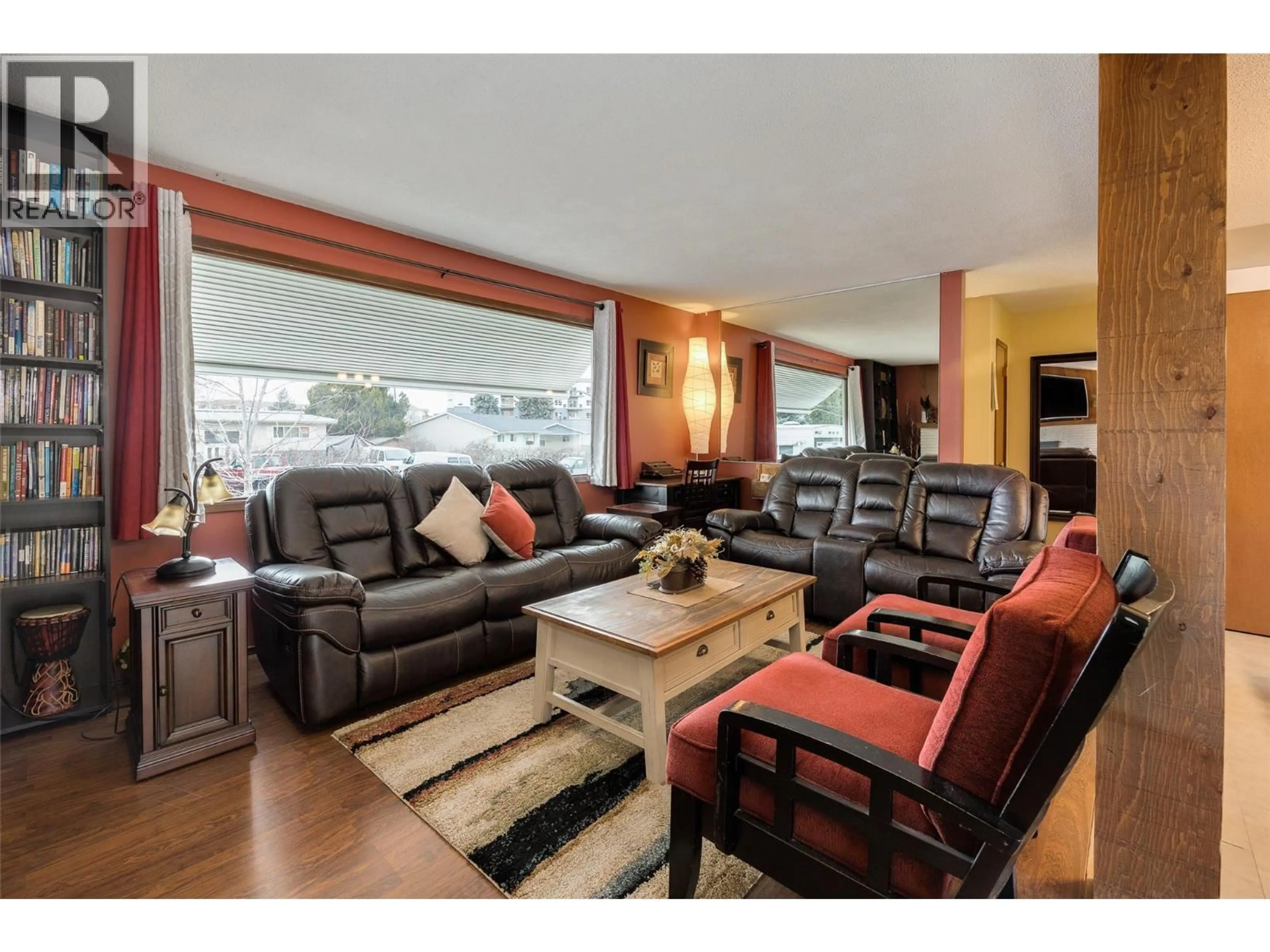 Living room with furniture, wood/laminate floor for 185 DELL ROAD, Rutland British Columbia V1X3P5