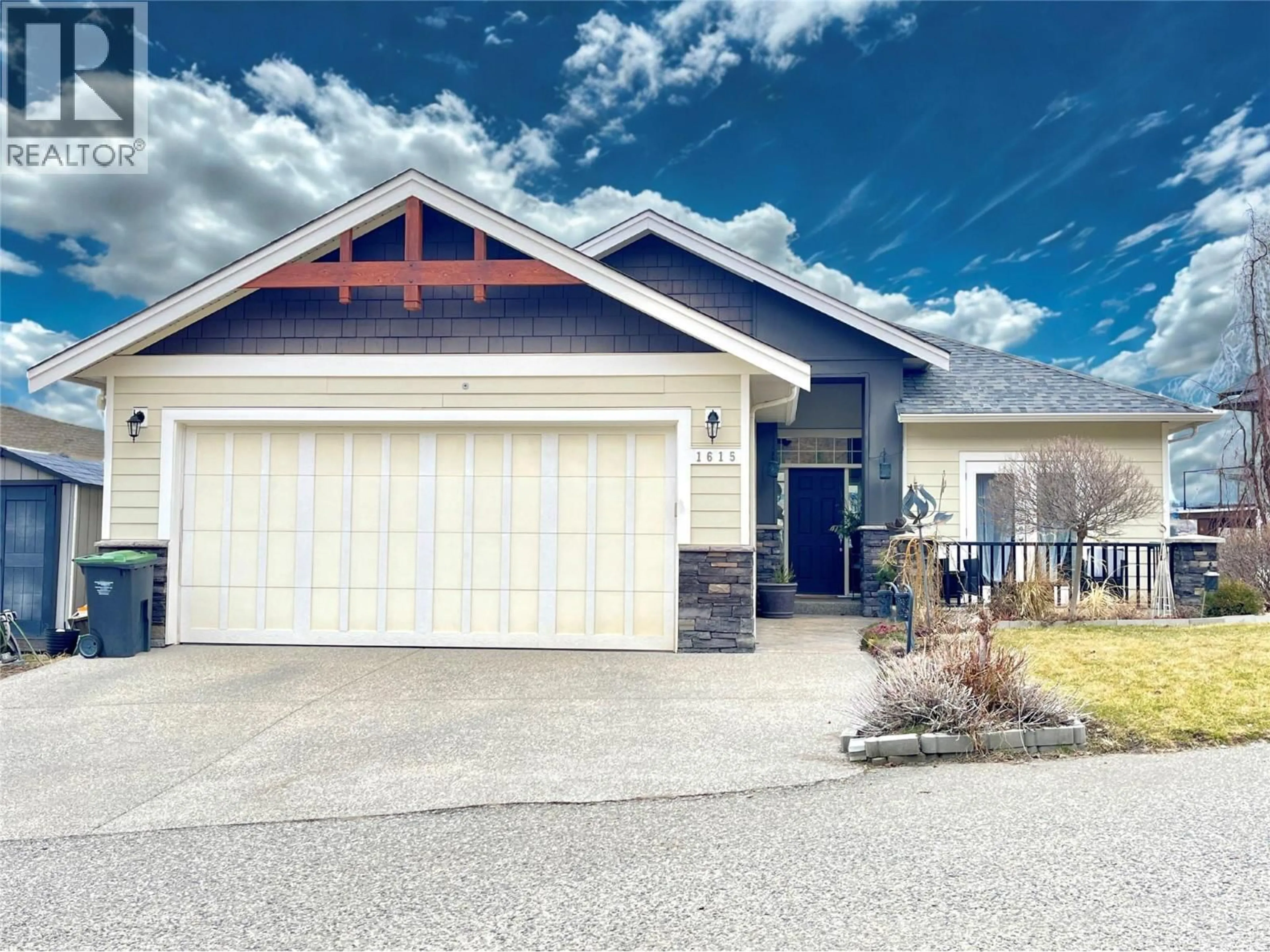 Home with vinyl exterior material, street for 1615 SUNRISE ROAD, Kelowna British Columbia V1P1N9