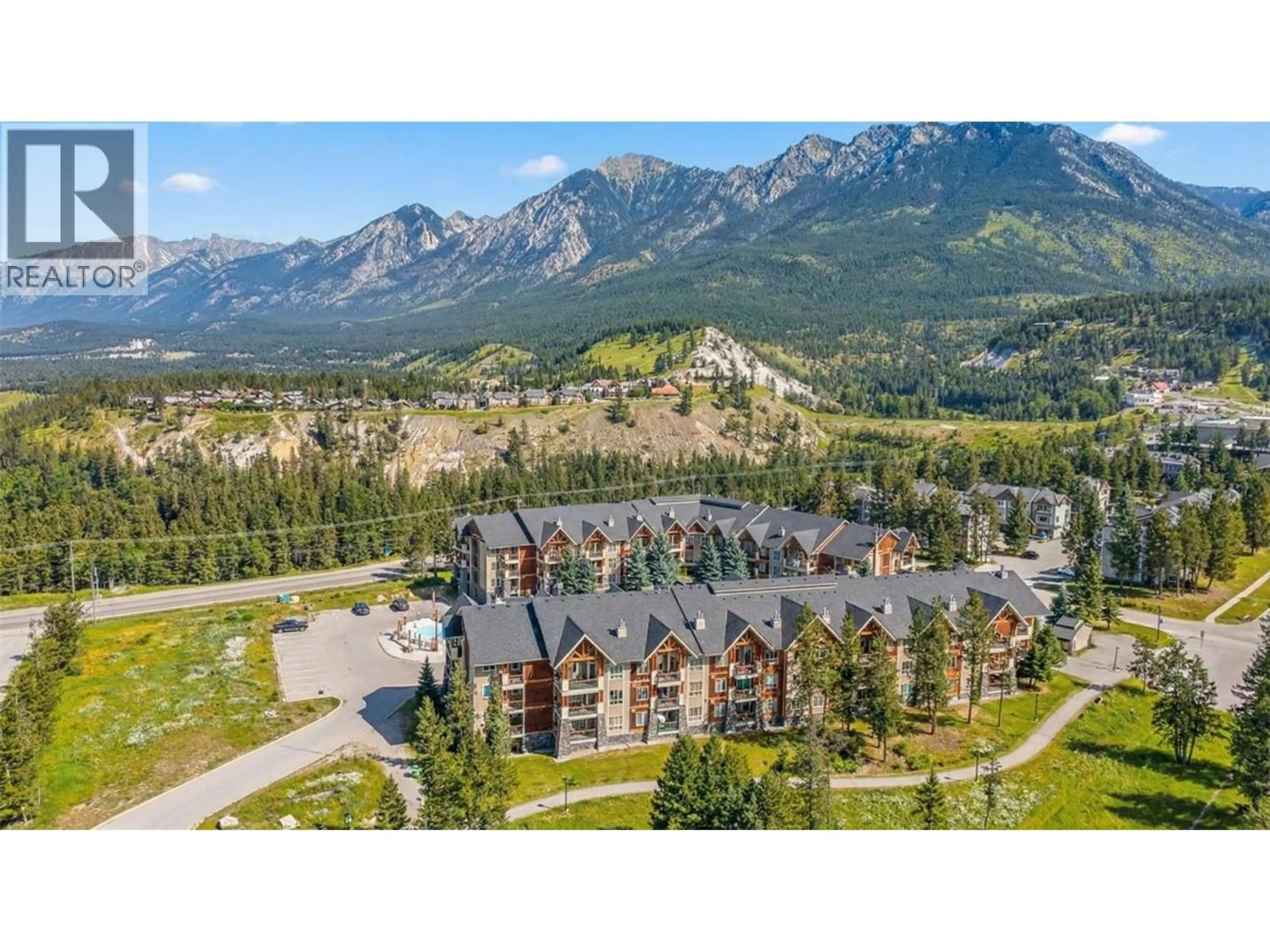 A pic from outside/outdoor area/front of a property/back of a property/a pic from drone, mountain view for 2112 - 7495 COLUMBIA AVENUE, Radium Hot Springs British Columbia V0A1M0