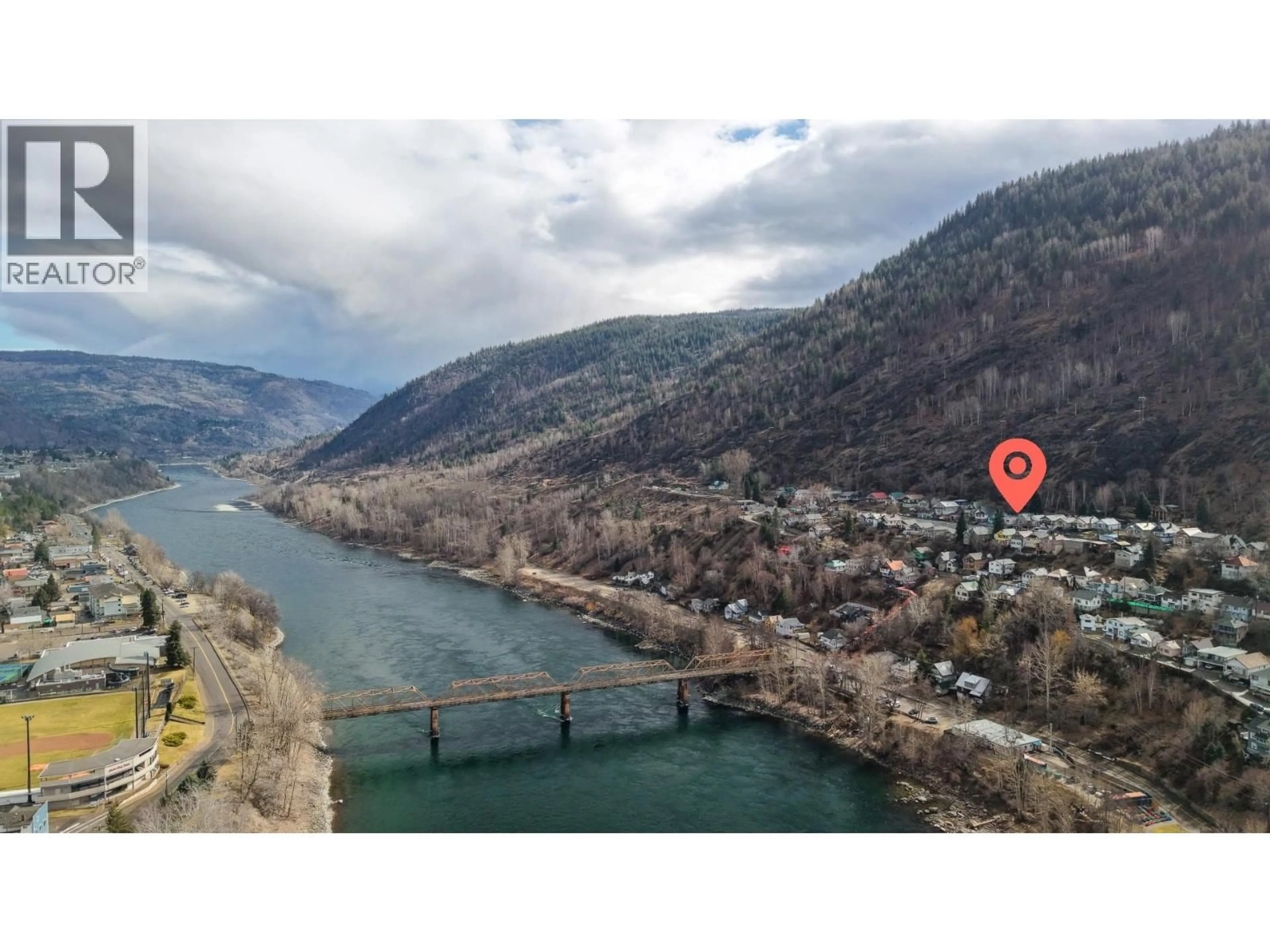A pic from outside/outdoor area/front of a property/back of a property/a pic from drone, water/lake/river/ocean view for 2078 TOPPING STREET, Trail British Columbia V1R4G5