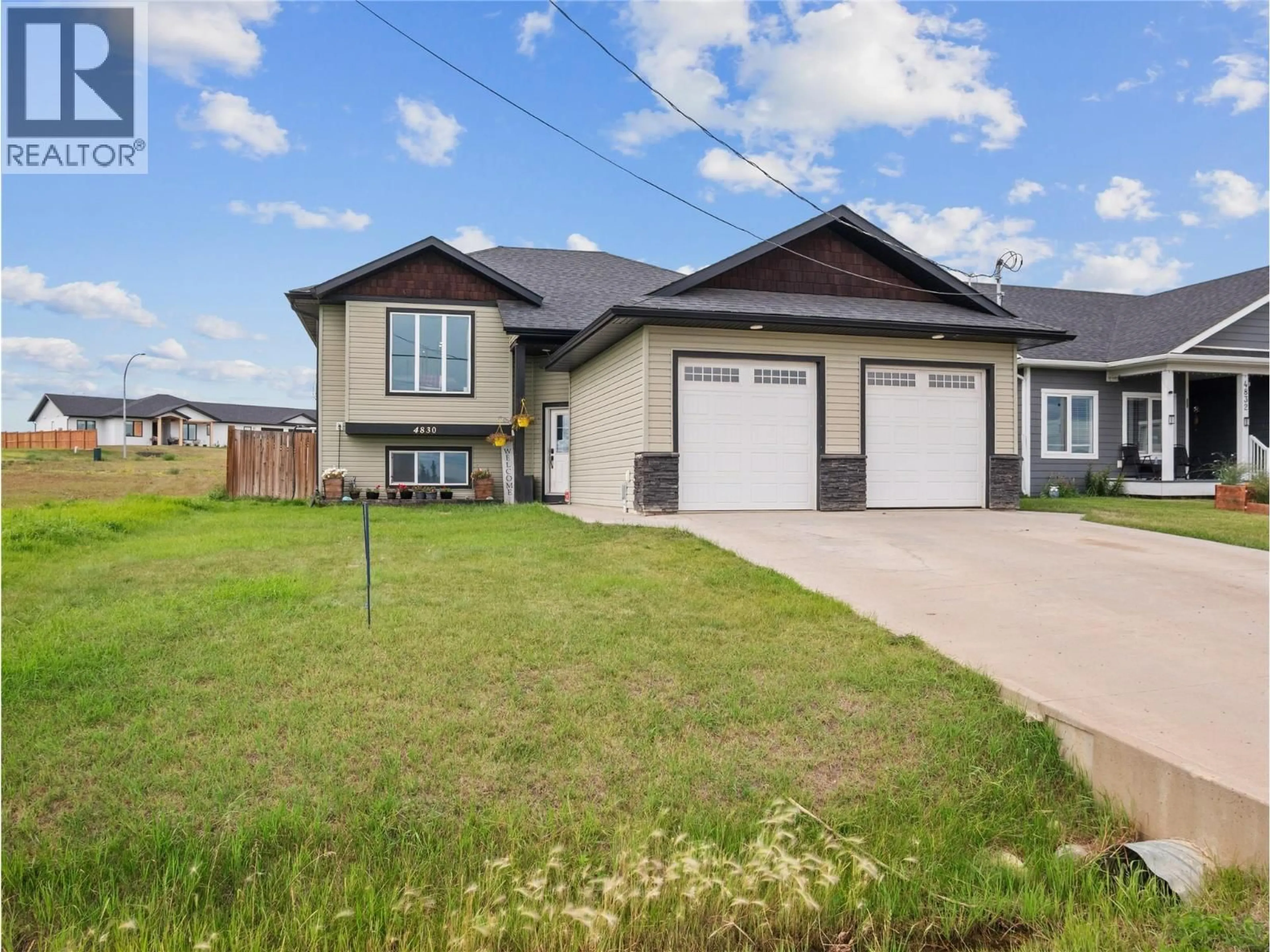 Home with vinyl exterior material, street for 4830 ELEVATOR ROAD, Pouce Coupe British Columbia V0C2C0