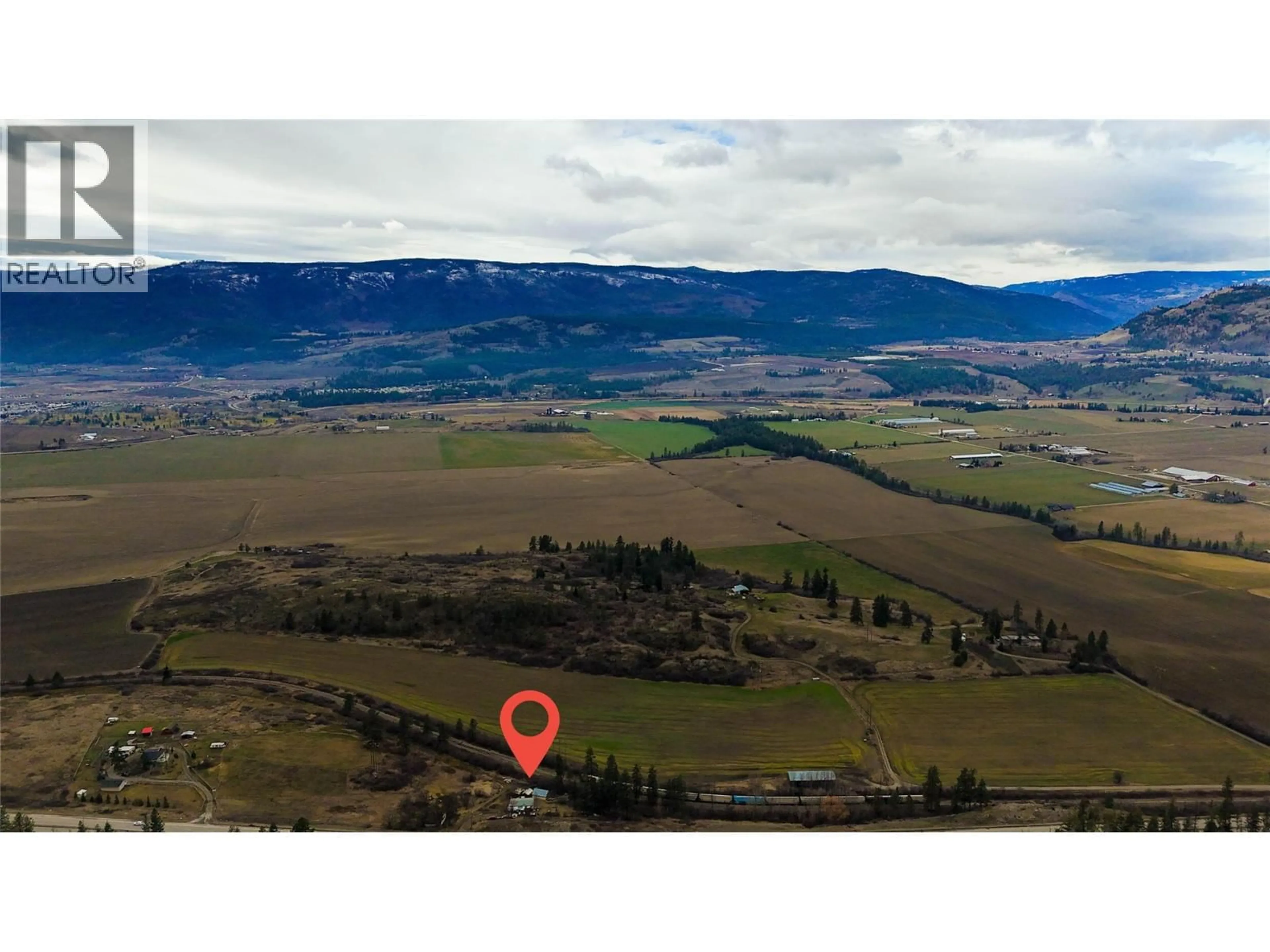A pic from outside/outdoor area/front of a property/back of a property/a pic from drone, mountain view for 327 97A HIGHWAY, Spallumcheen British Columbia V0E1B6