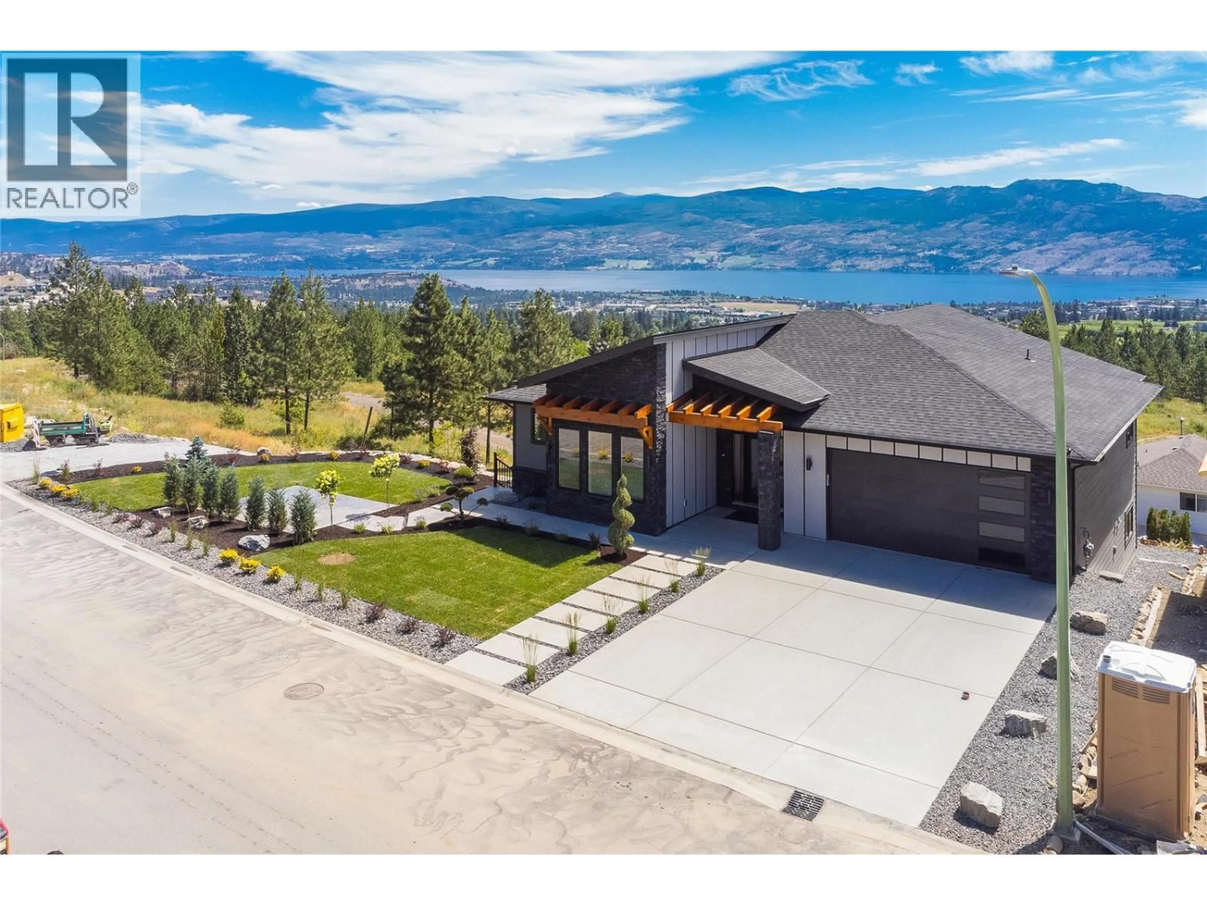 A pic from outside/outdoor area/front of a property/back of a property/a pic from drone, mountain view for 2803 COPPER RIDGE DRIVE, West Kelowna British Columbia V4T2X3