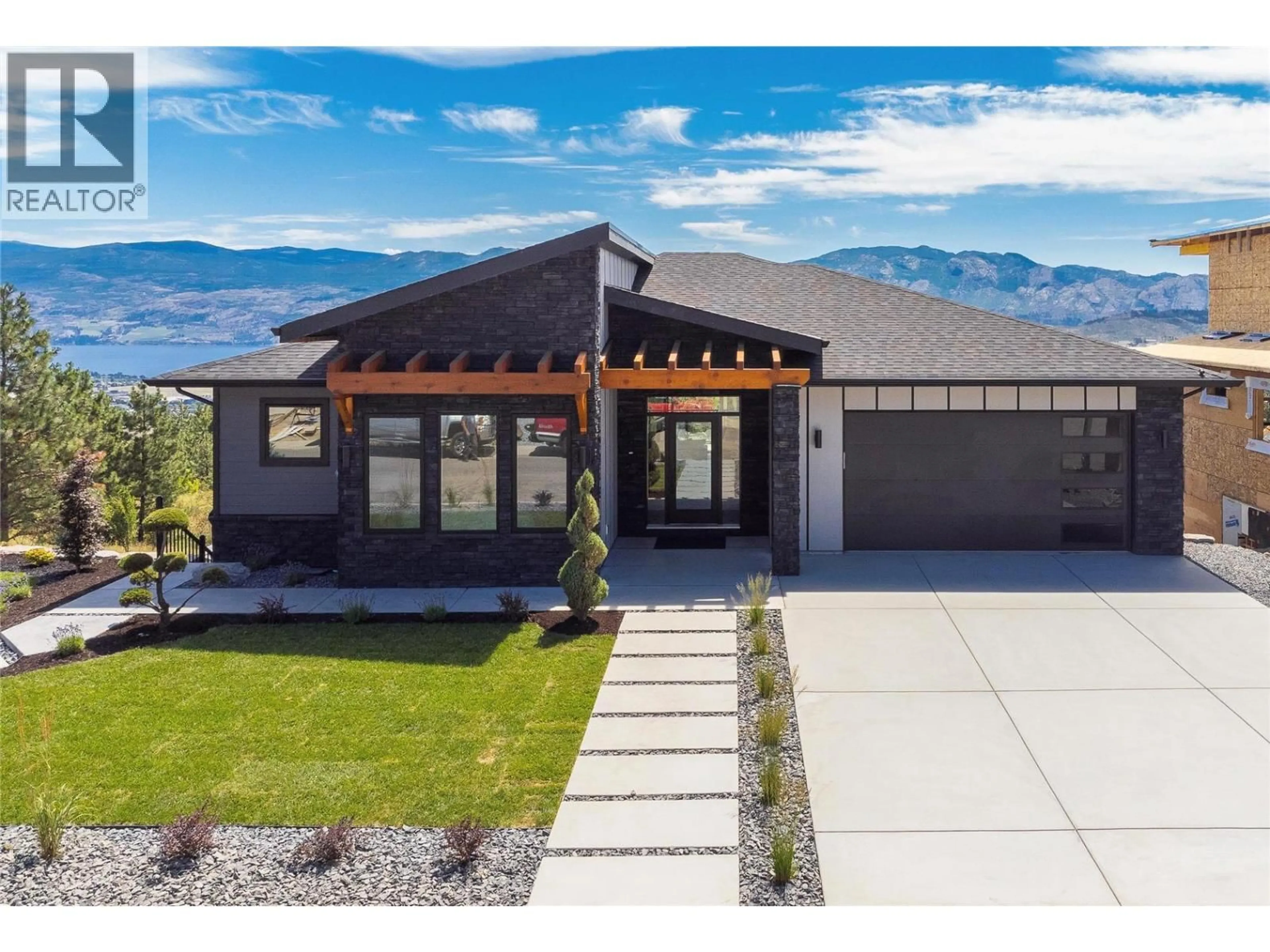 Home with vinyl exterior material, mountain view for 2803 COPPER RIDGE DRIVE, West Kelowna British Columbia V4T2X3
