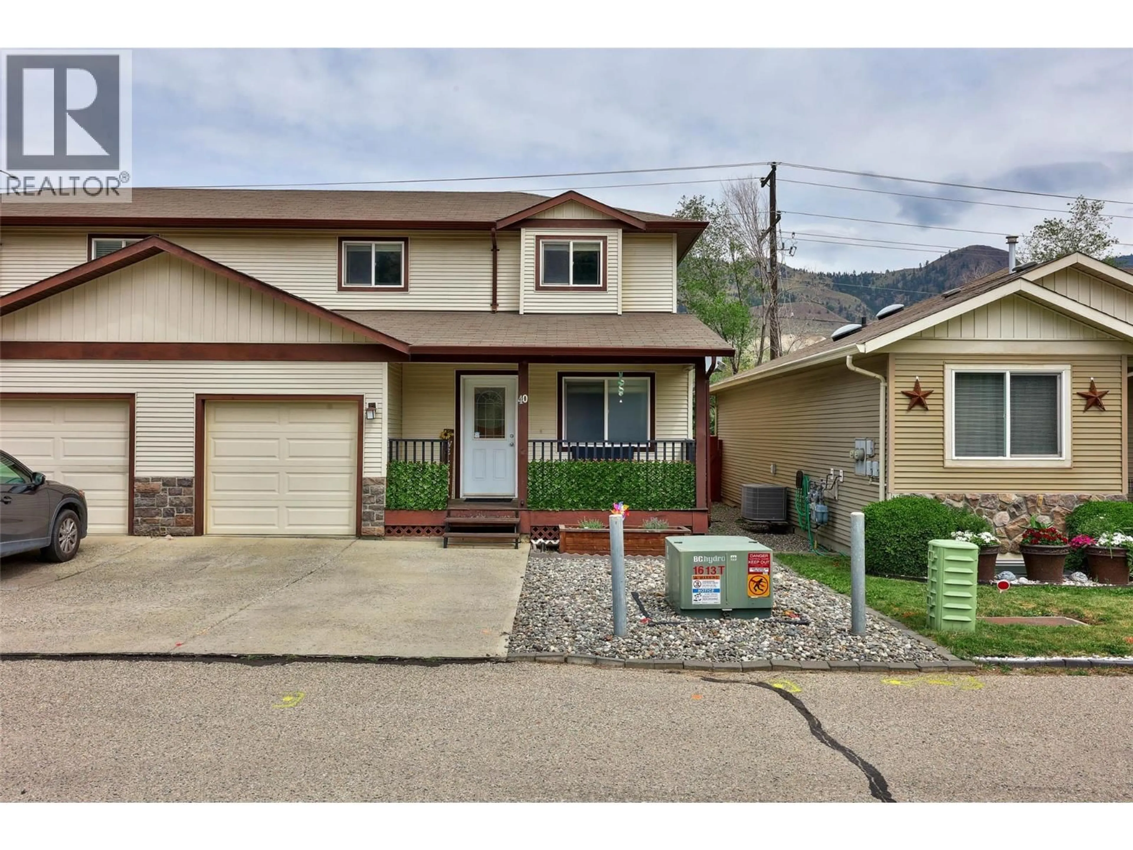 Home with vinyl exterior material, street for 40 - 5200 DALLAS DRIVE, Kamloops British Columbia V2C6Y8