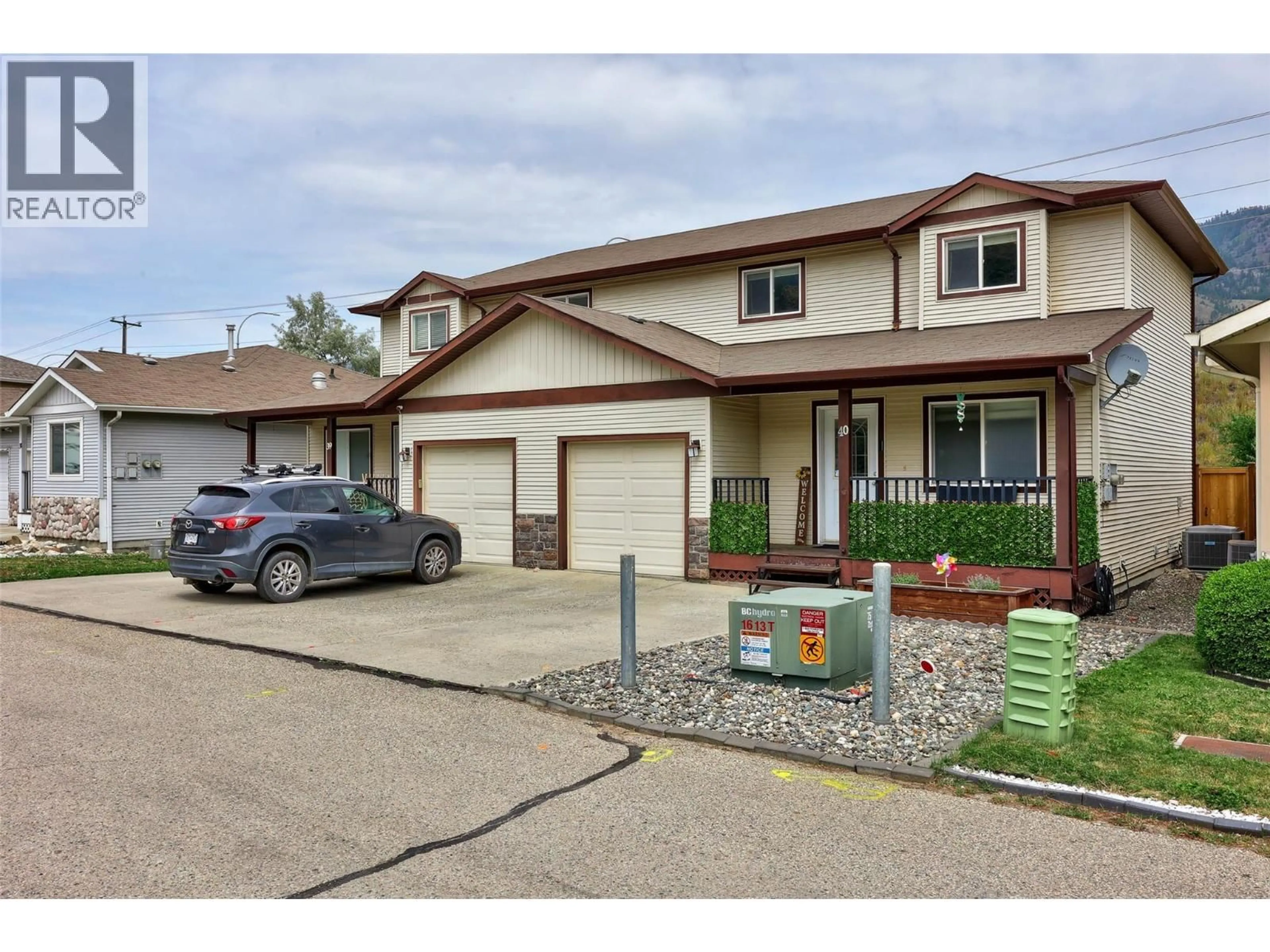 Home with vinyl exterior material, street for 40 - 5200 DALLAS DRIVE, Kamloops British Columbia V2C6Y8