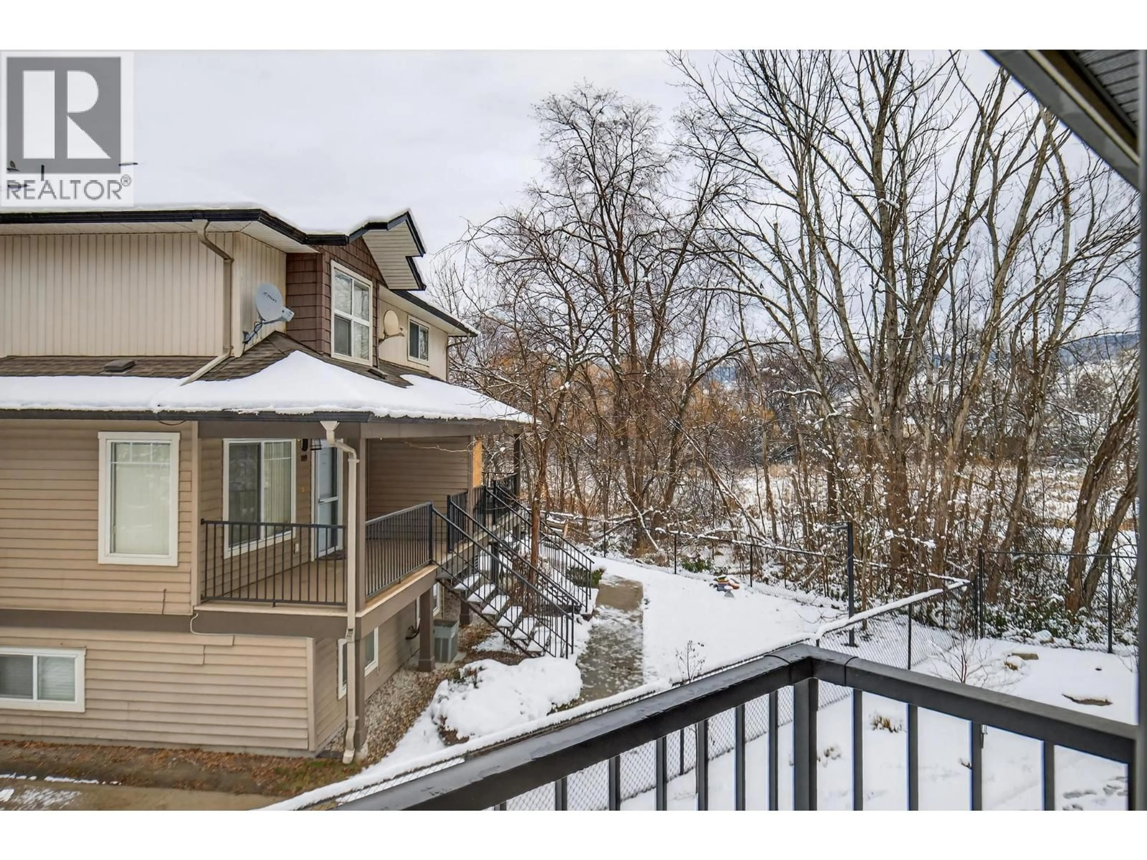 A pic from outside/outdoor area/front of a property/back of a property/a pic from drone, unknown for 9 - 1297 FINDLAY ROAD, Kelowna British Columbia V1X5B1