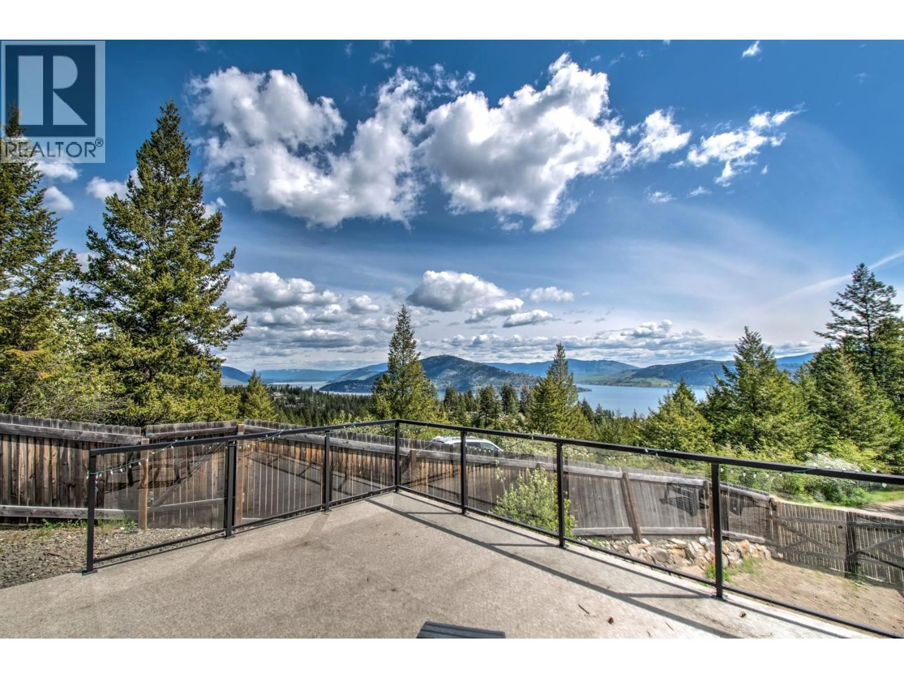 A pic from outside/outdoor area/front of a property/back of a property/a pic from drone, mountain view for 354 LAKEWOOD ROAD, Vernon British Columbia V1H2B9