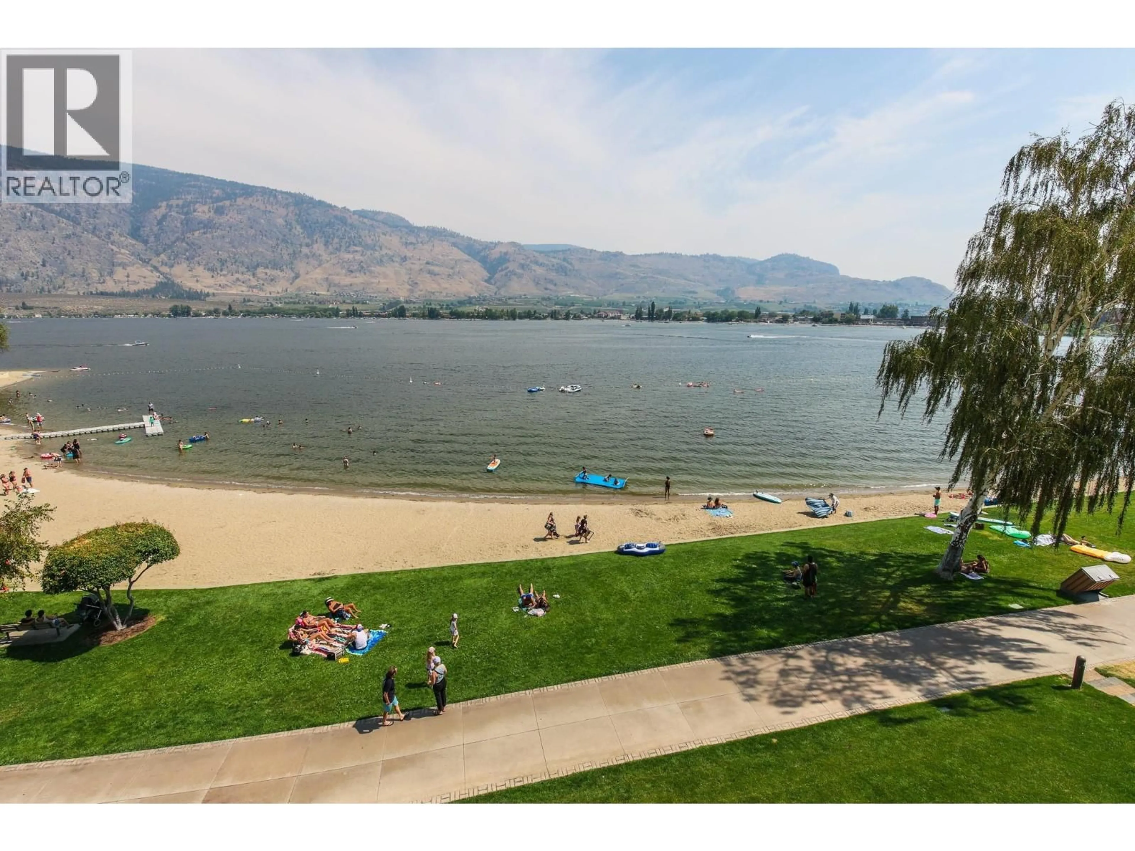 A pic from outside/outdoor area/front of a property/back of a property/a pic from drone, water/lake/river/ocean view for 304-15 PARK PLACE, Osoyoos British Columbia V0H1V0