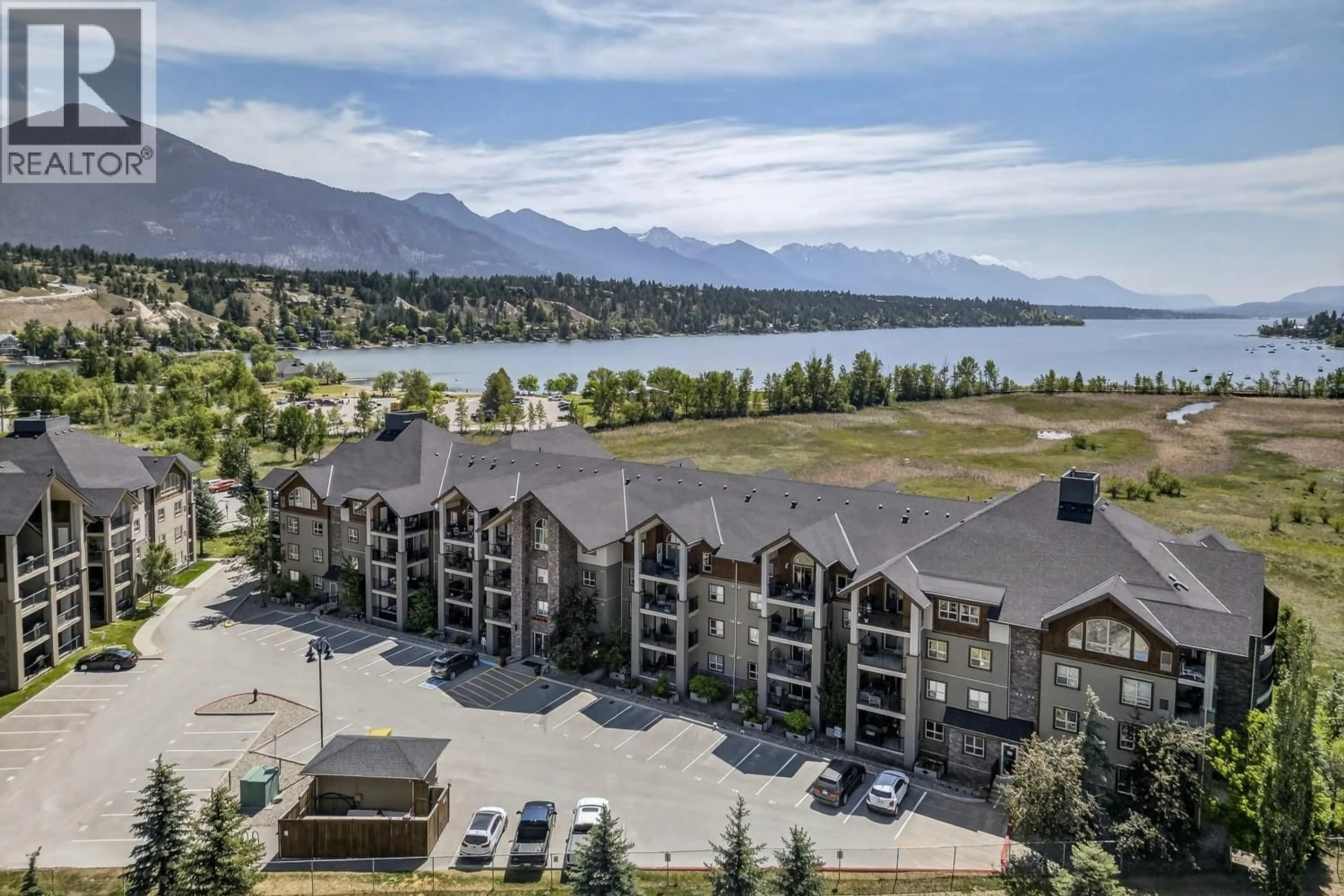 A pic from outside/outdoor area/front of a property/back of a property/a pic from drone, water/lake/river/ocean view for 1406 - 205 THIRD AVENUE, Invermere British Columbia V0A1K7