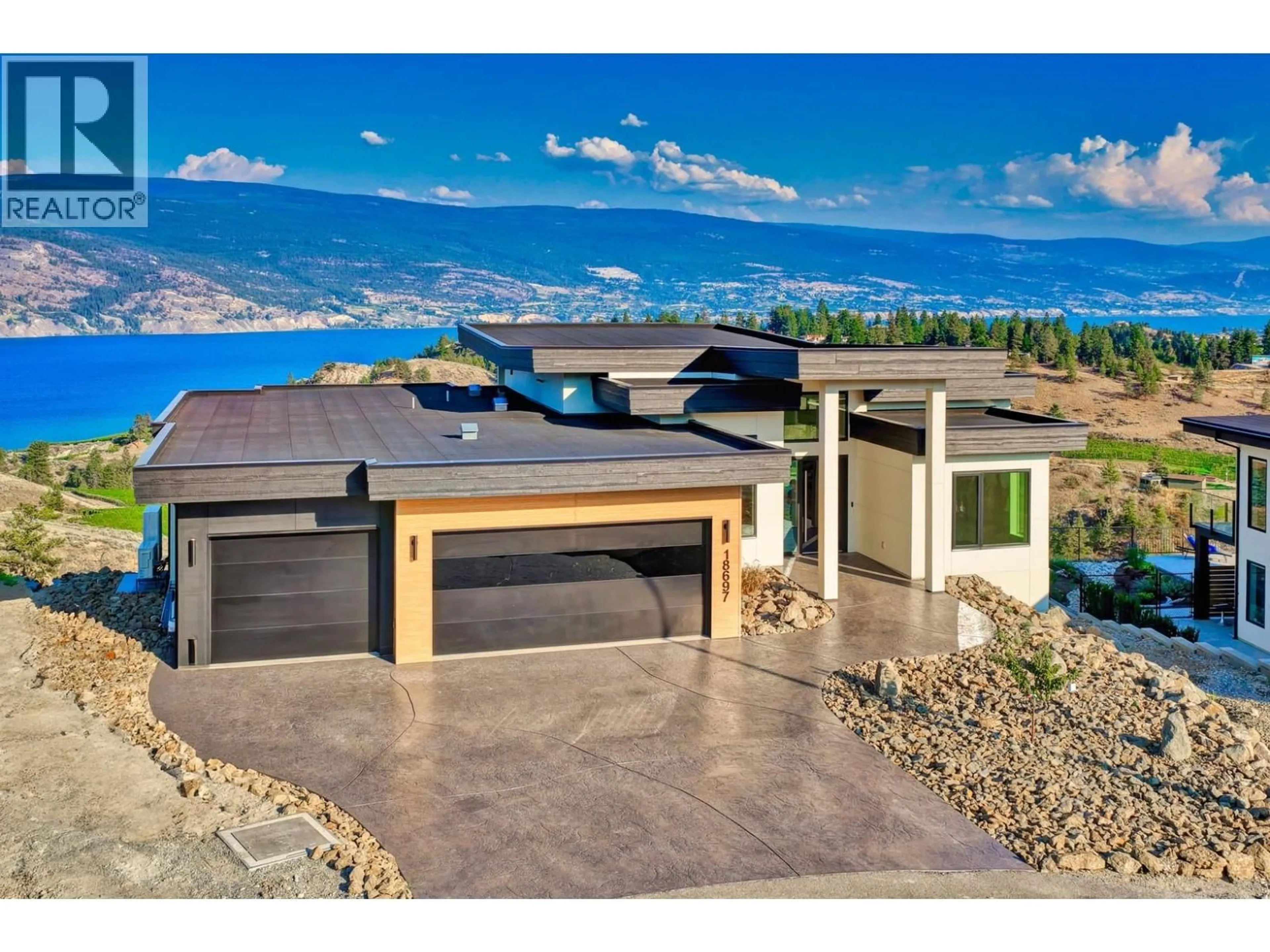 A pic from outside/outdoor area/front of a property/back of a property/a pic from drone, water/lake/river/ocean view for 18697 MCKENZIE COURT, Summerland British Columbia V0H1Z3