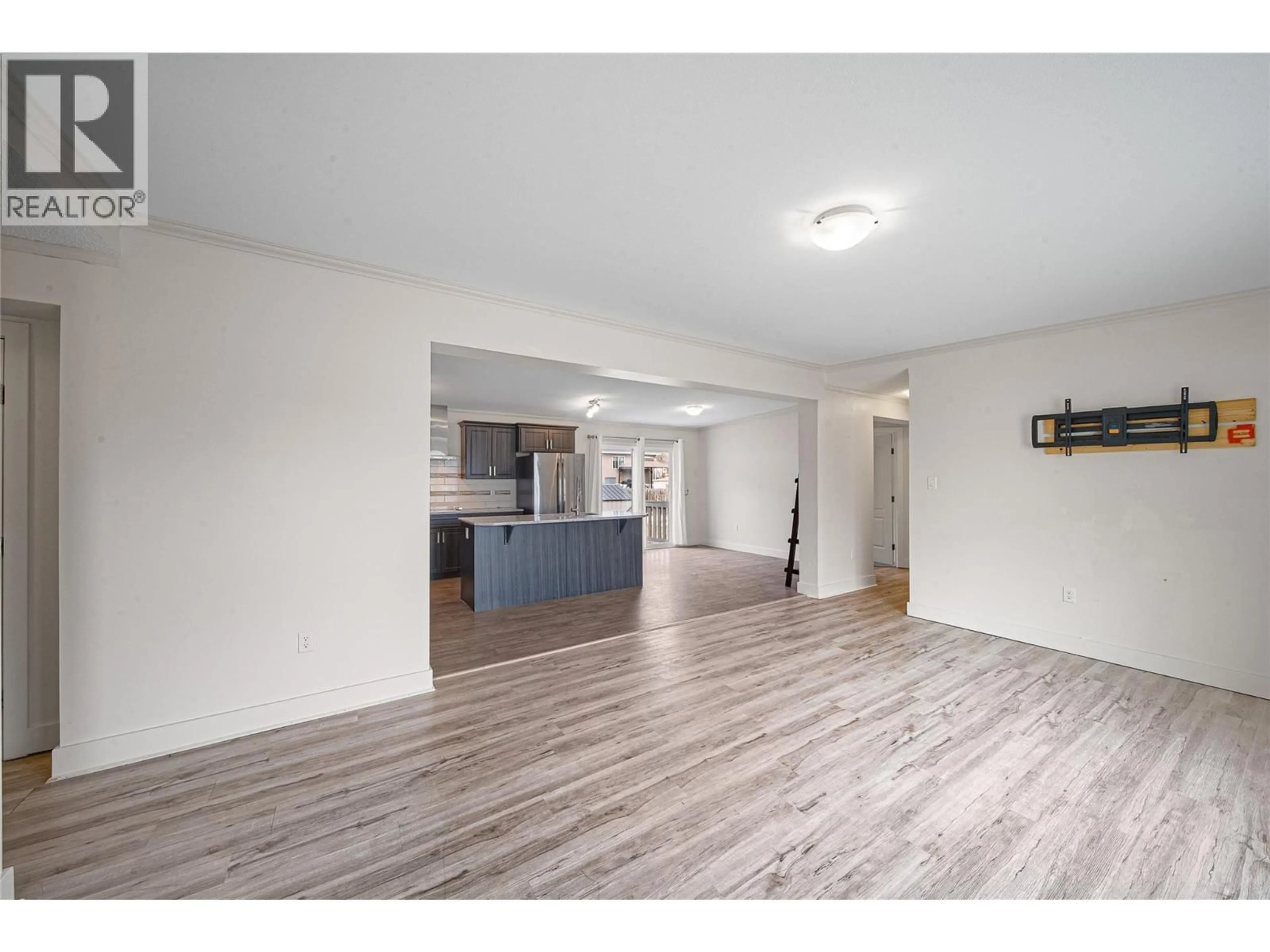 Open concept kitchen, wood/laminate floor for B11 - 7155 DALLAS DRIVE, Kamloops British Columbia V2C4T1