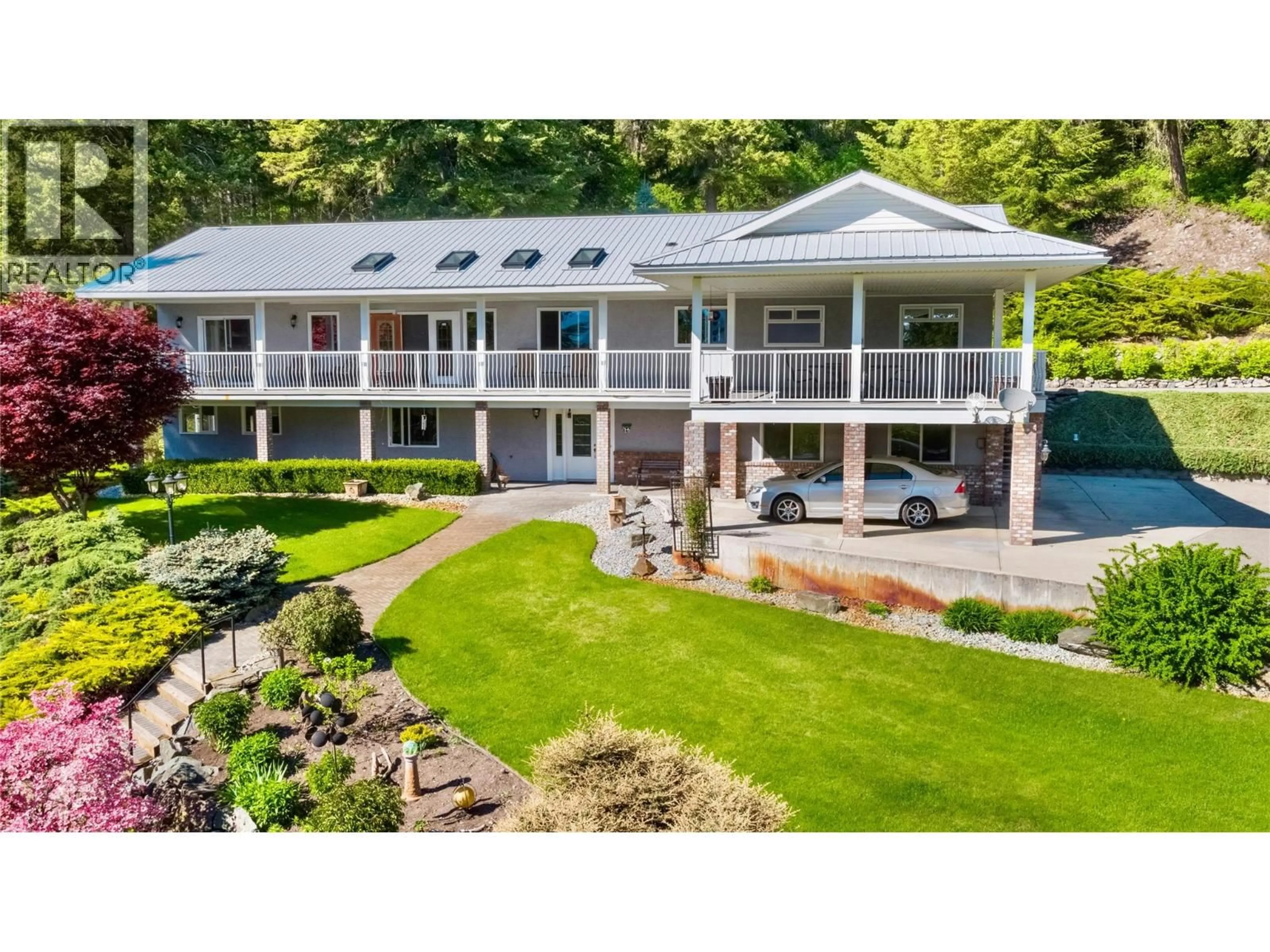 A pic from outside/outdoor area/front of a property/back of a property/a pic from drone, water/lake/river/ocean view for 3855 TURNER ROAD, Tappen British Columbia V0E2X1