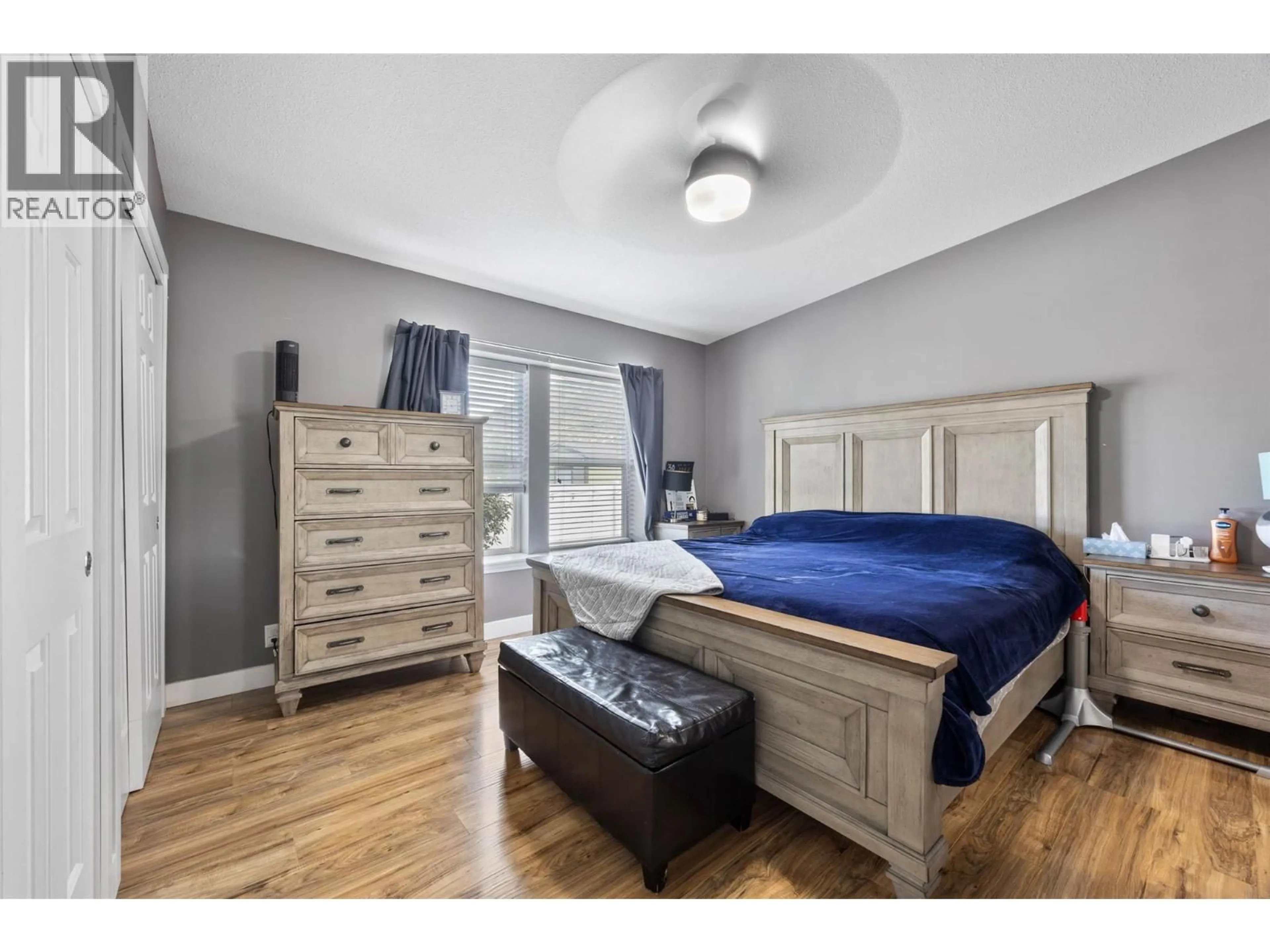 Bedroom with bed, wood/laminate floor for 73 - 1030 RICARDO ROAD, Kamloops British Columbia V2H0C7