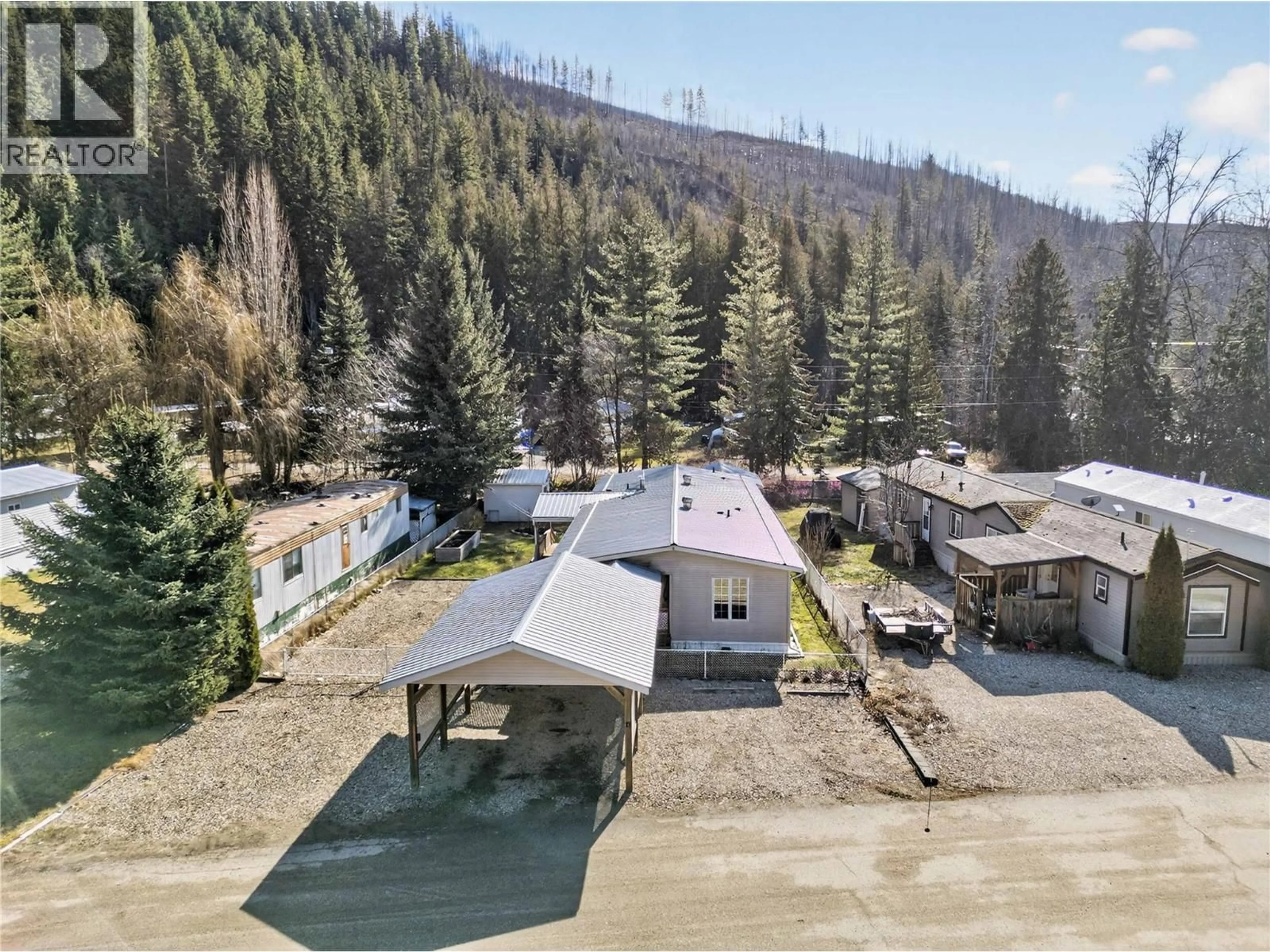 A pic from outside/outdoor area/front of a property/back of a property/a pic from drone, unknown for 11 - SICAMOUS CREEK MOBILE HOME PARK CREEK, Sicamous British Columbia V0E2V1
