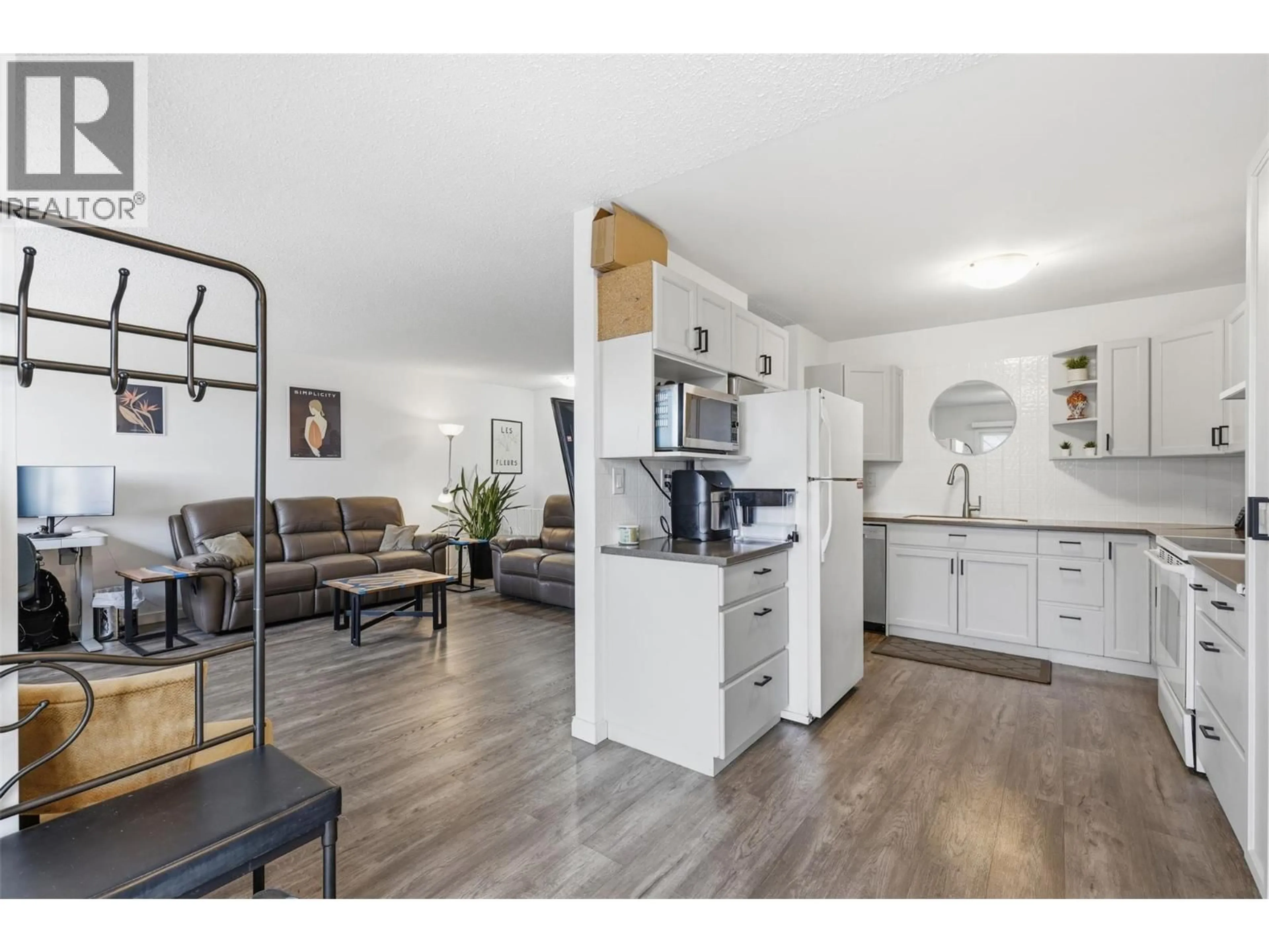 Open concept kitchen, wood/laminate floor for 317 WADDINGTON DRIVE, Kamloops British Columbia V2E1S3
