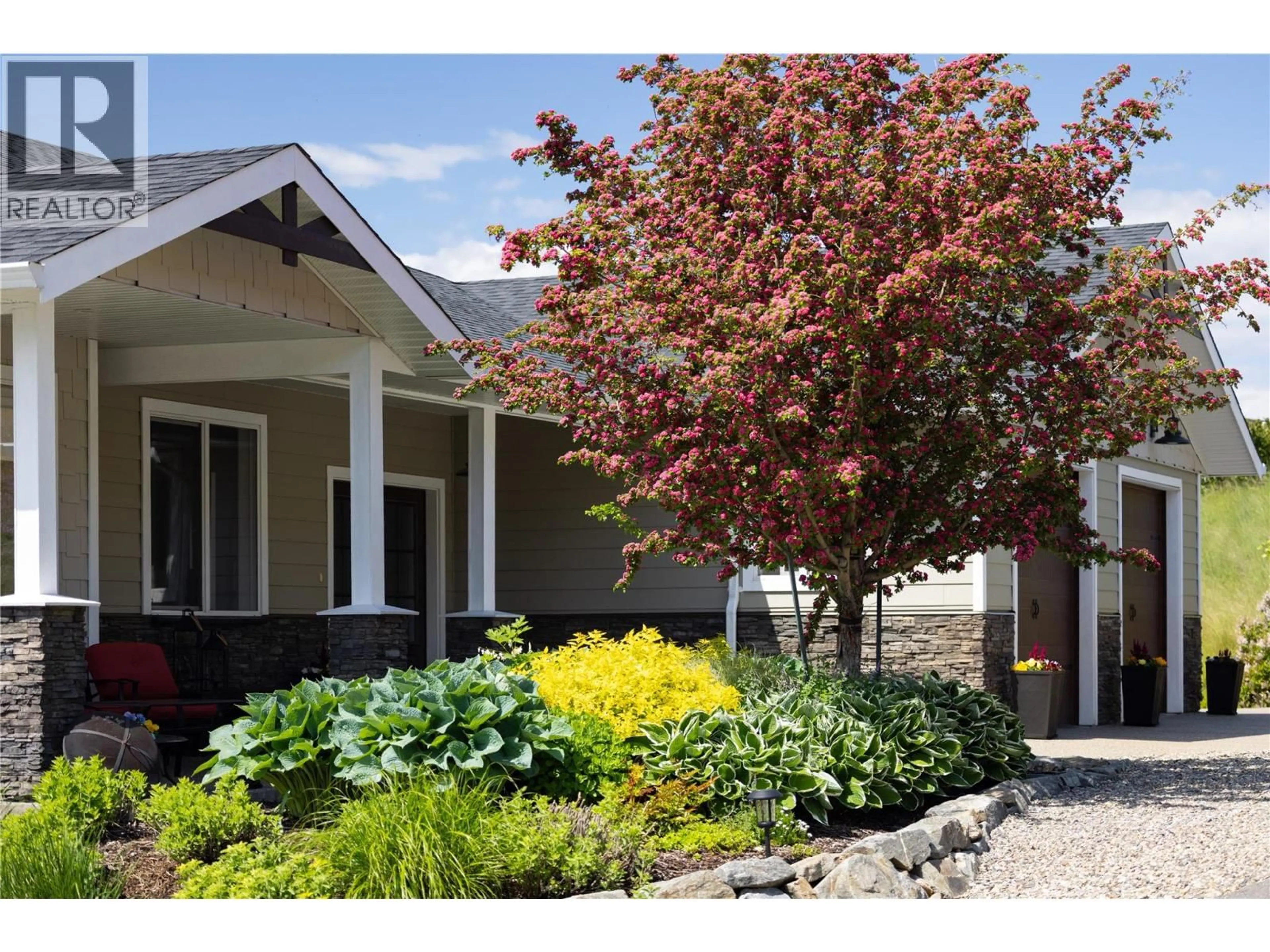 Home with vinyl exterior material, street for 98 RANCHLAND PLACE, Coldstream British Columbia V1B4C9