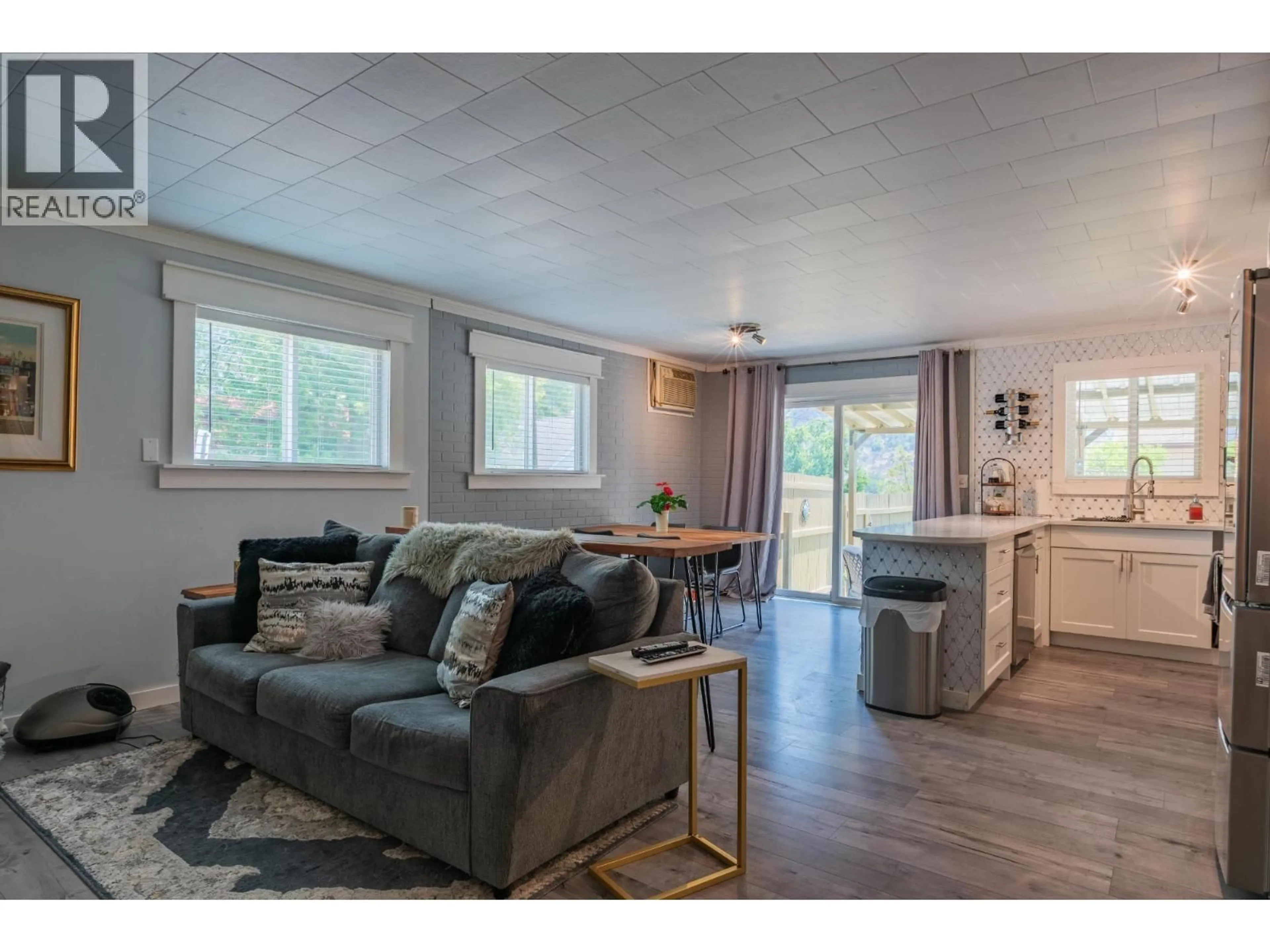 Living room with furniture, wood/laminate floor for 2194 SIXTH AVENUE, Trail British Columbia V1R3B7