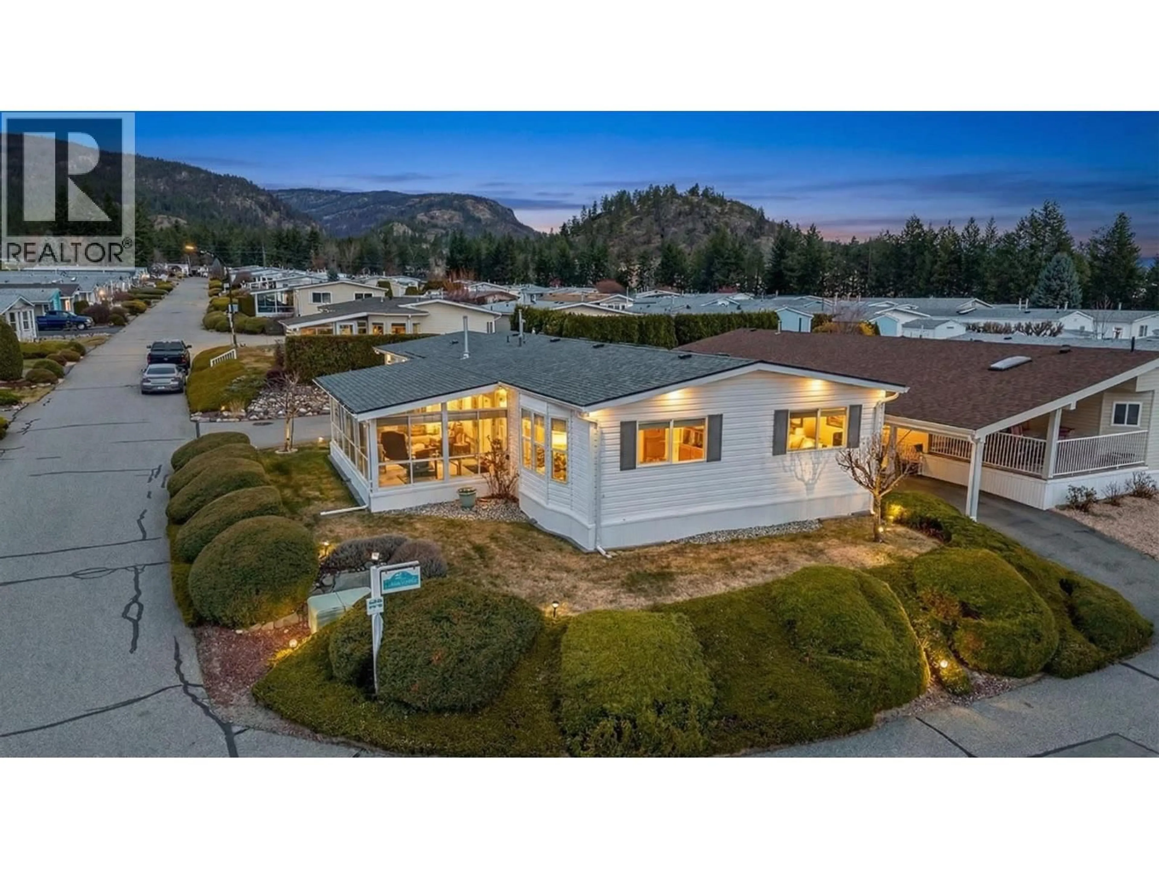 A pic from outside/outdoor area/front of a property/back of a property/a pic from drone, mountain view for 109 - 1850 SHANNON LAKE ROAD, West Kelowna British Columbia V1Z1A9