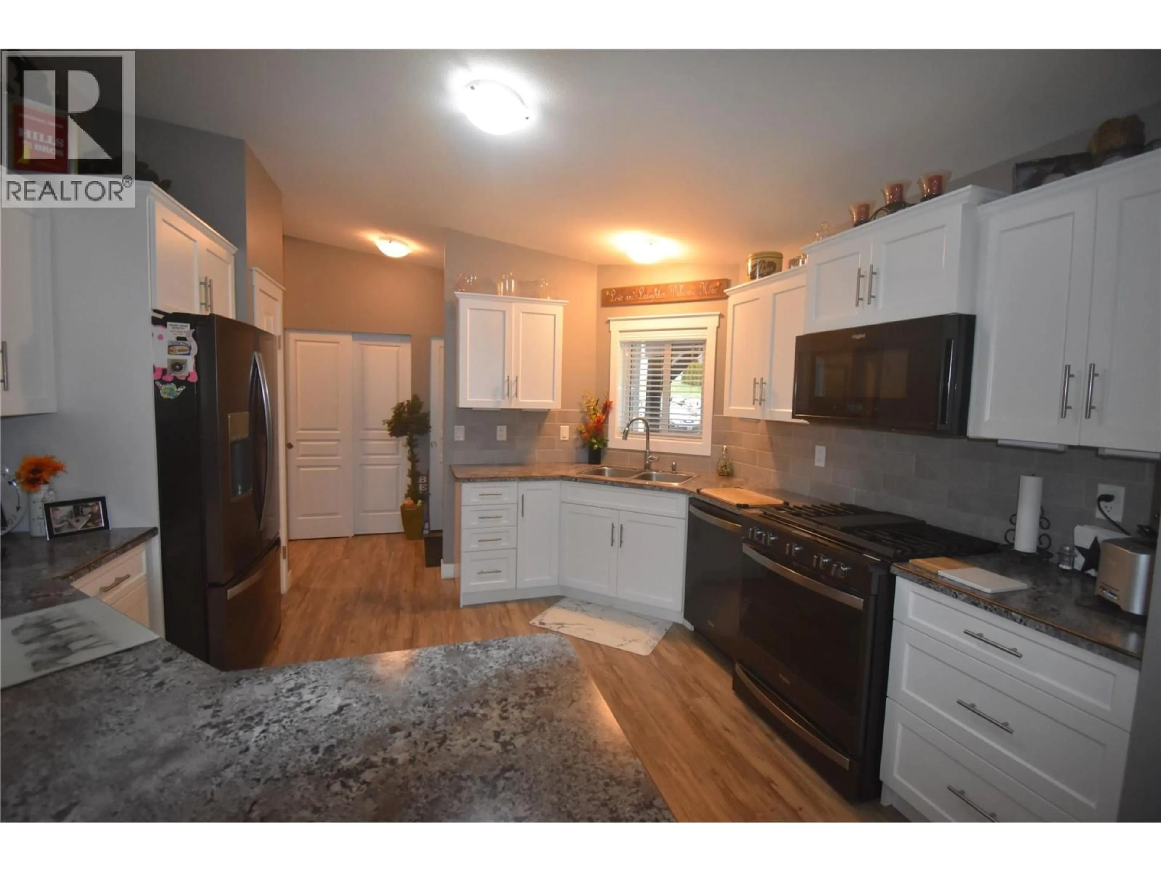 Open concept kitchen, unknown for 611 17TH AVENUE, Genelle British Columbia V0G1G0
