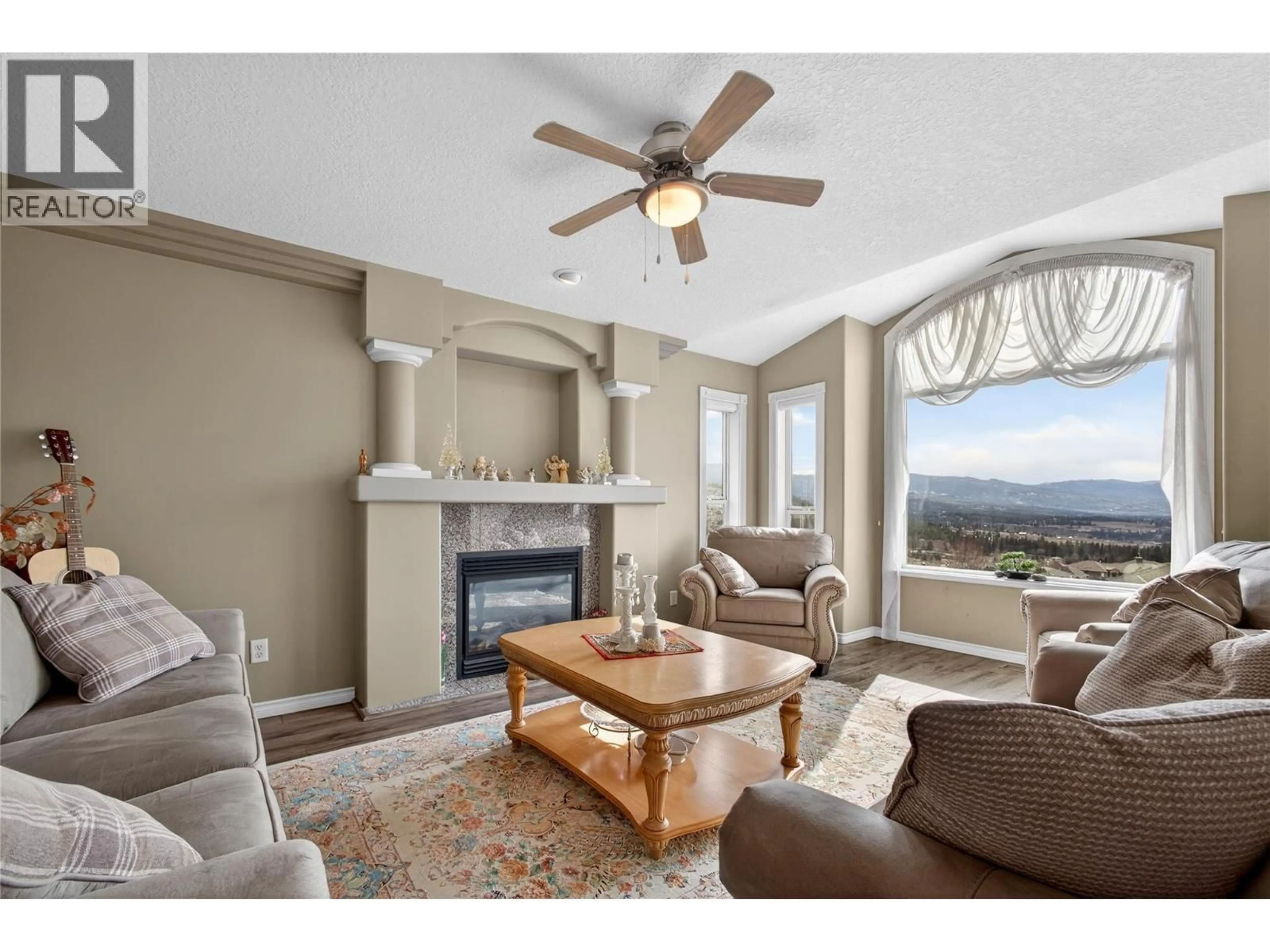 Living room with furniture, unknown for 1562 LONGLEY CRESCENT, Kelowna British Columbia V1P1M9