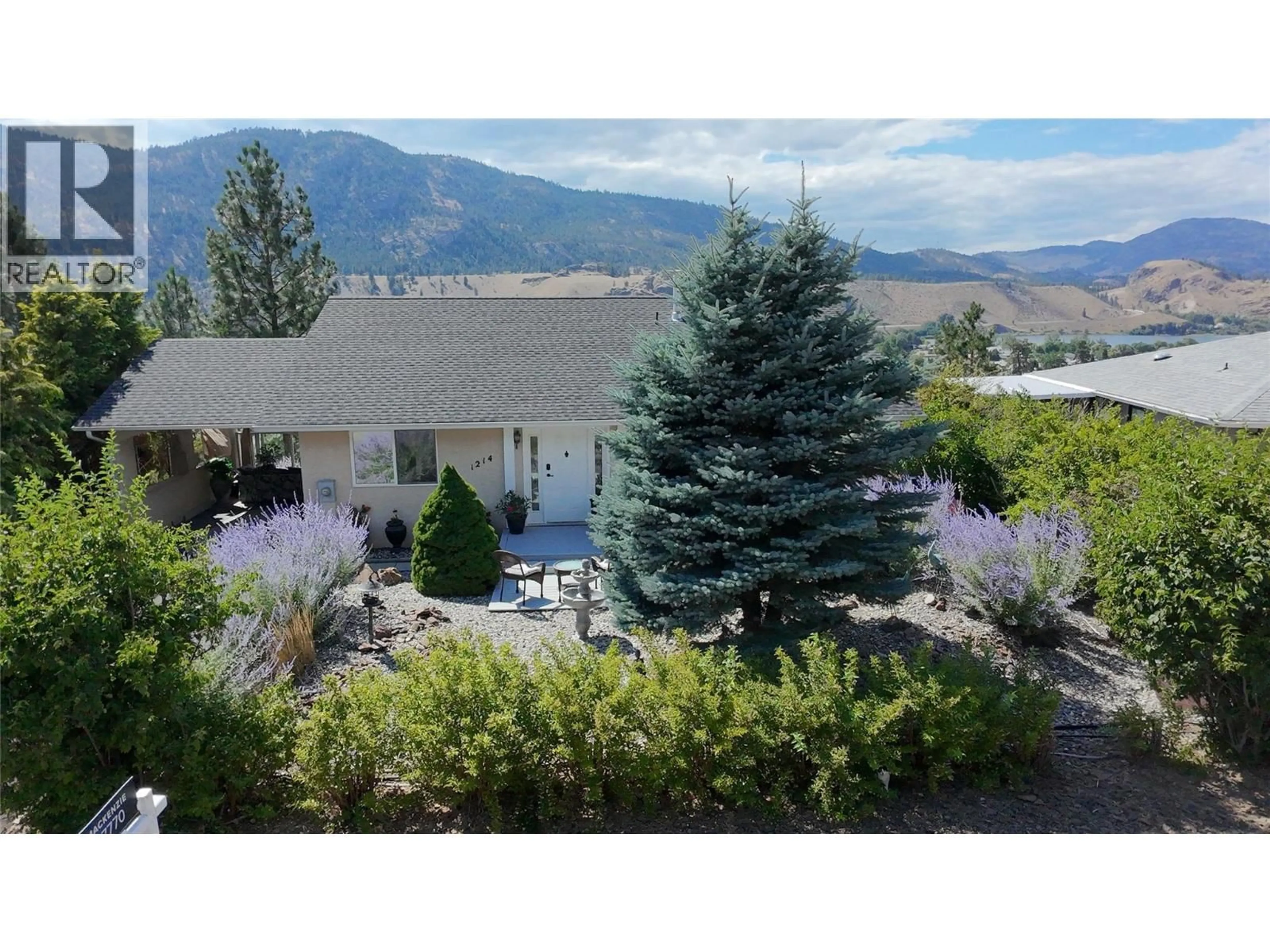 A pic from outside/outdoor area/front of a property/back of a property/a pic from drone, mountain view for 1214 PEACHCLIFF DRIVE, Okanagan Falls British Columbia V0H1R1